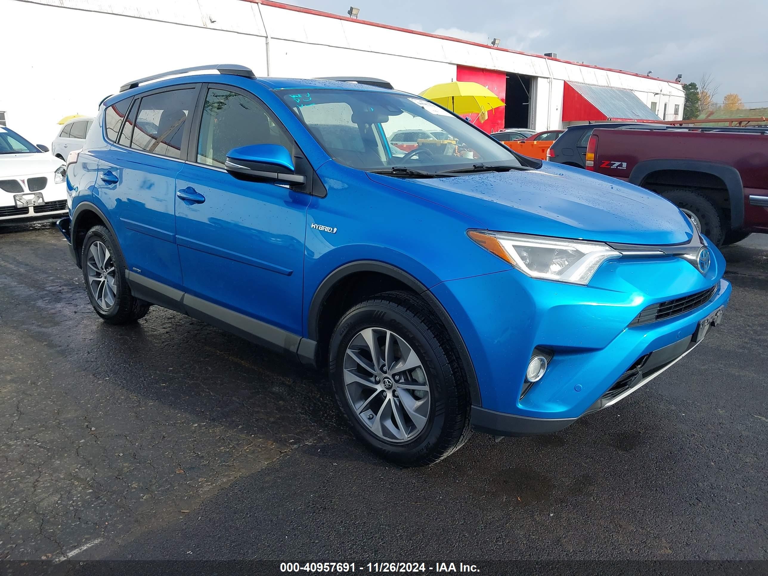 2018 Toyota Rav4 Hv VIN JTMRJREVXJD173337 — IAAI salvage auction photo