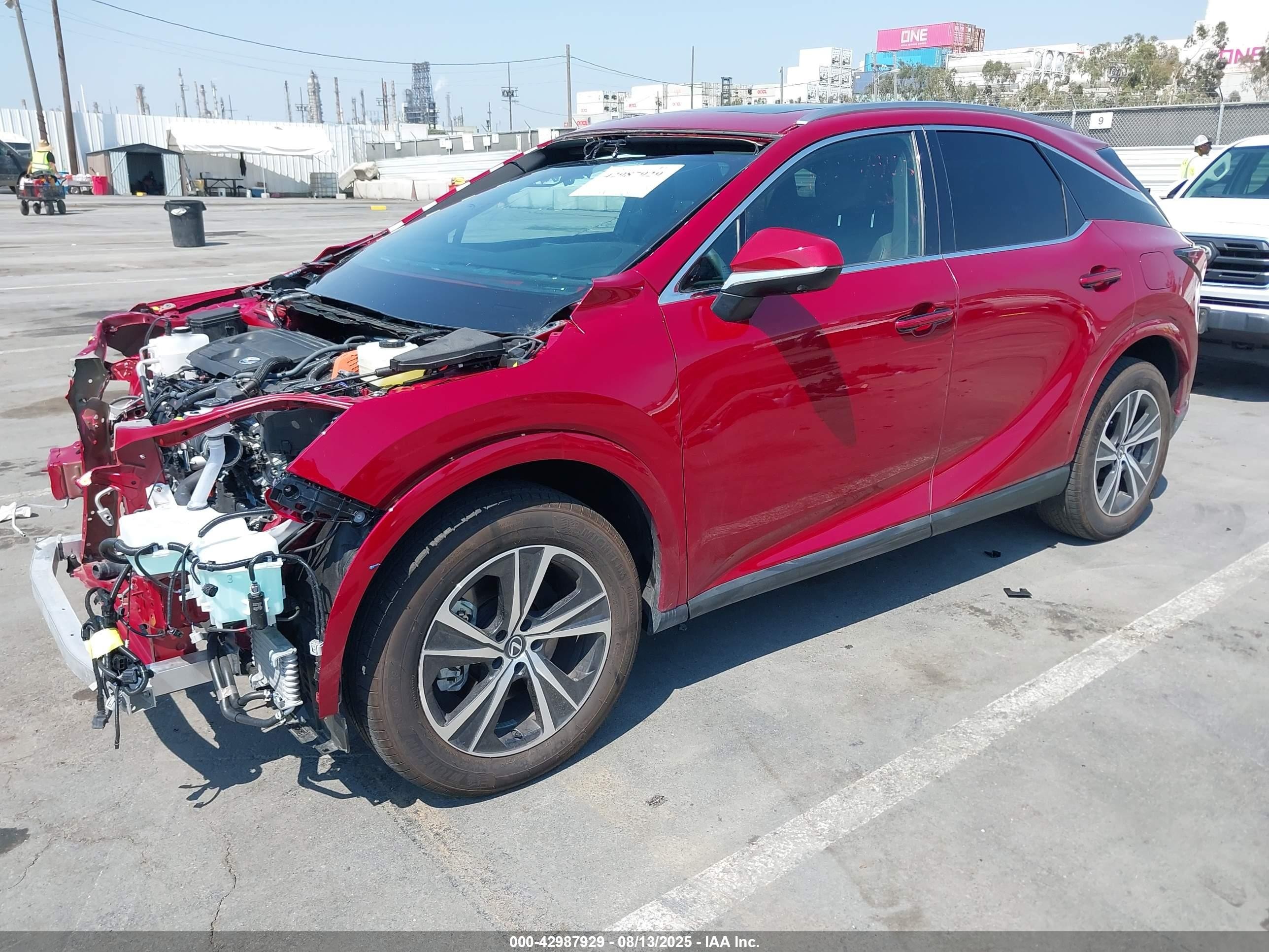 2024 Lexus Rx 350h VIN 2T2BBMCA5RC042435 IAAI salvage auction — Front & Rear, Salvage (California), sold $21,900 on 2025-10-20 (photo 2)