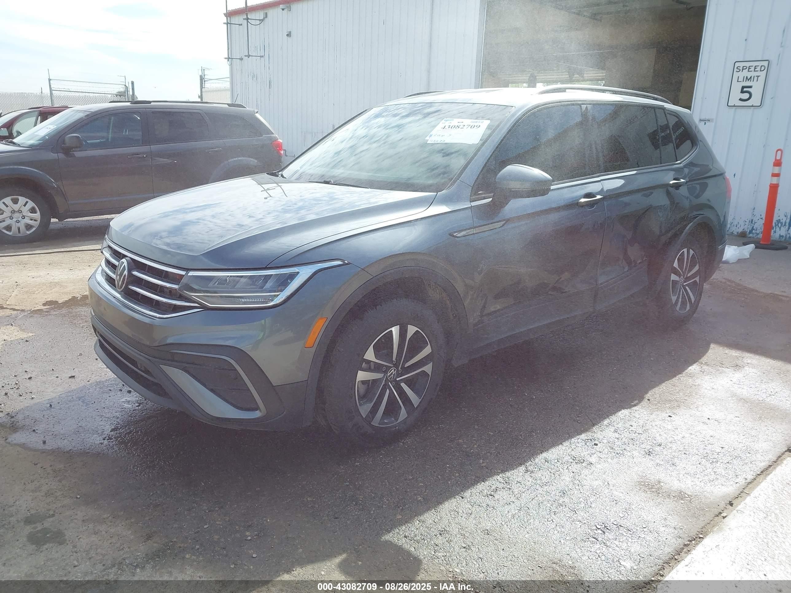 2023 Volkswagen Tiguan VIN 3VVFB7AX8PM078902 IAAI salvage auction — Side, Salvage (Oklahoma), sold $6,100 on 2026-03-18 (photo 2)