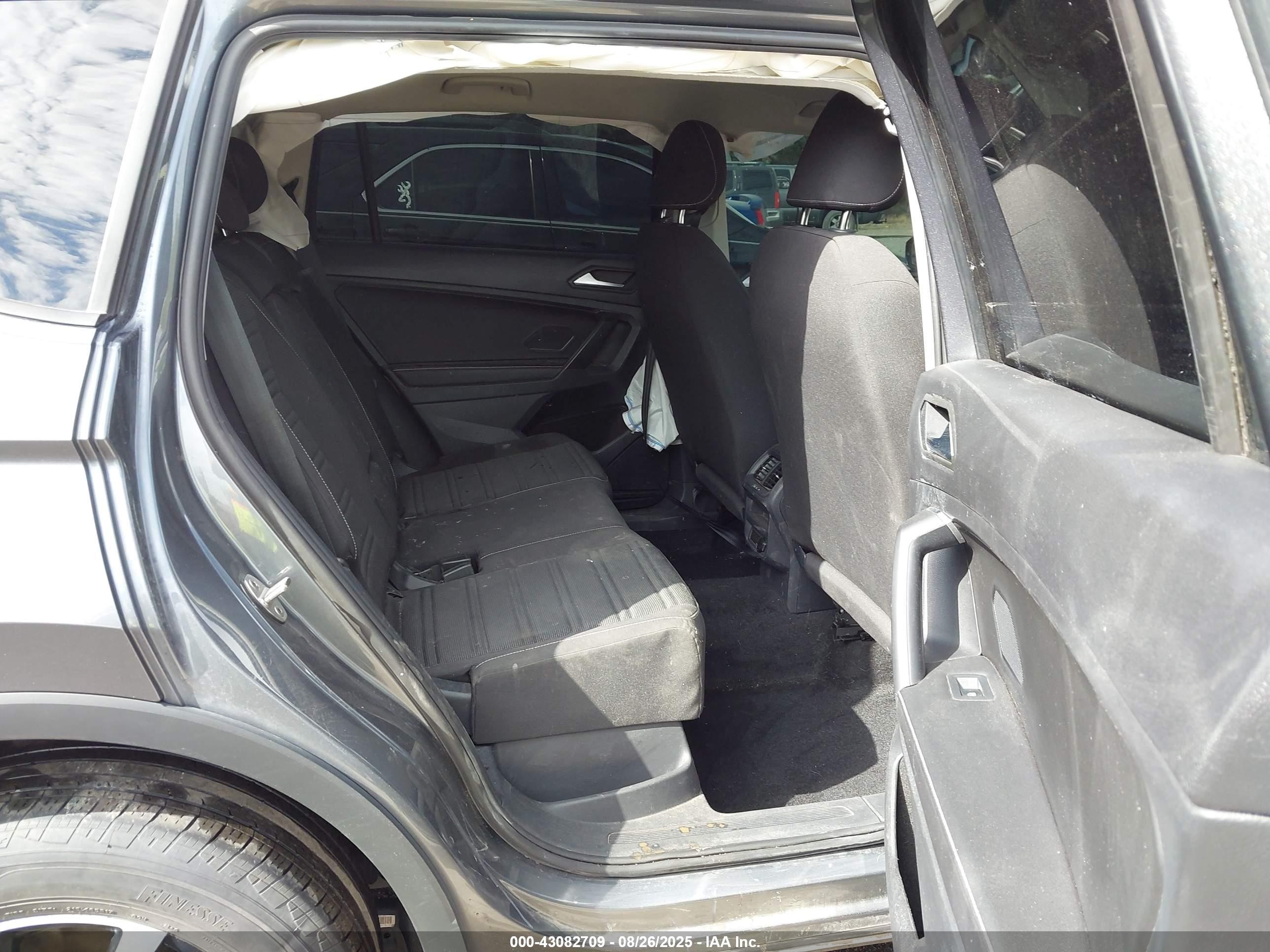 2023 Volkswagen Tiguan VIN 3VVFB7AX8PM078902 IAAI salvage auction — Side, Salvage (Oklahoma), sold $6,100 on 2026-03-18 (photo 8)