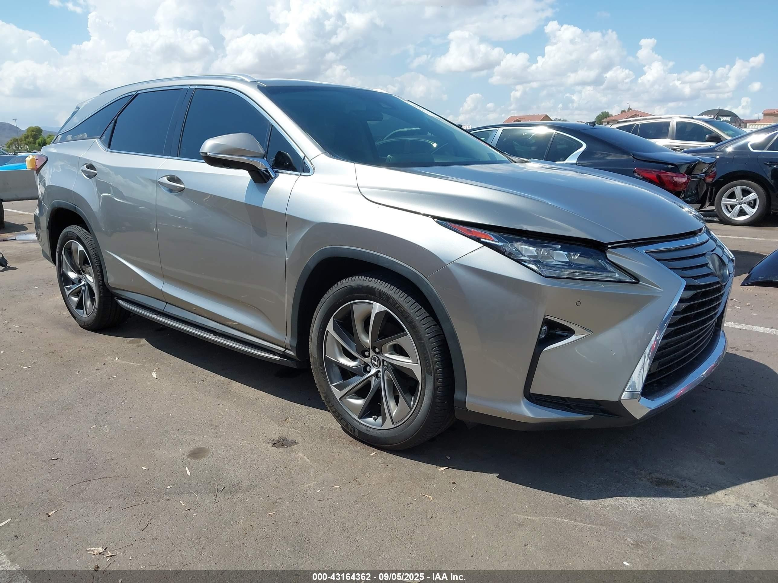 2019 Lexus RX 350L VIN JTJGZKCA2K2011851 IAAI salvage auction — Unknown, Salvage (Arizona), sold $10,100 on 2026-07-11 (photo 1)