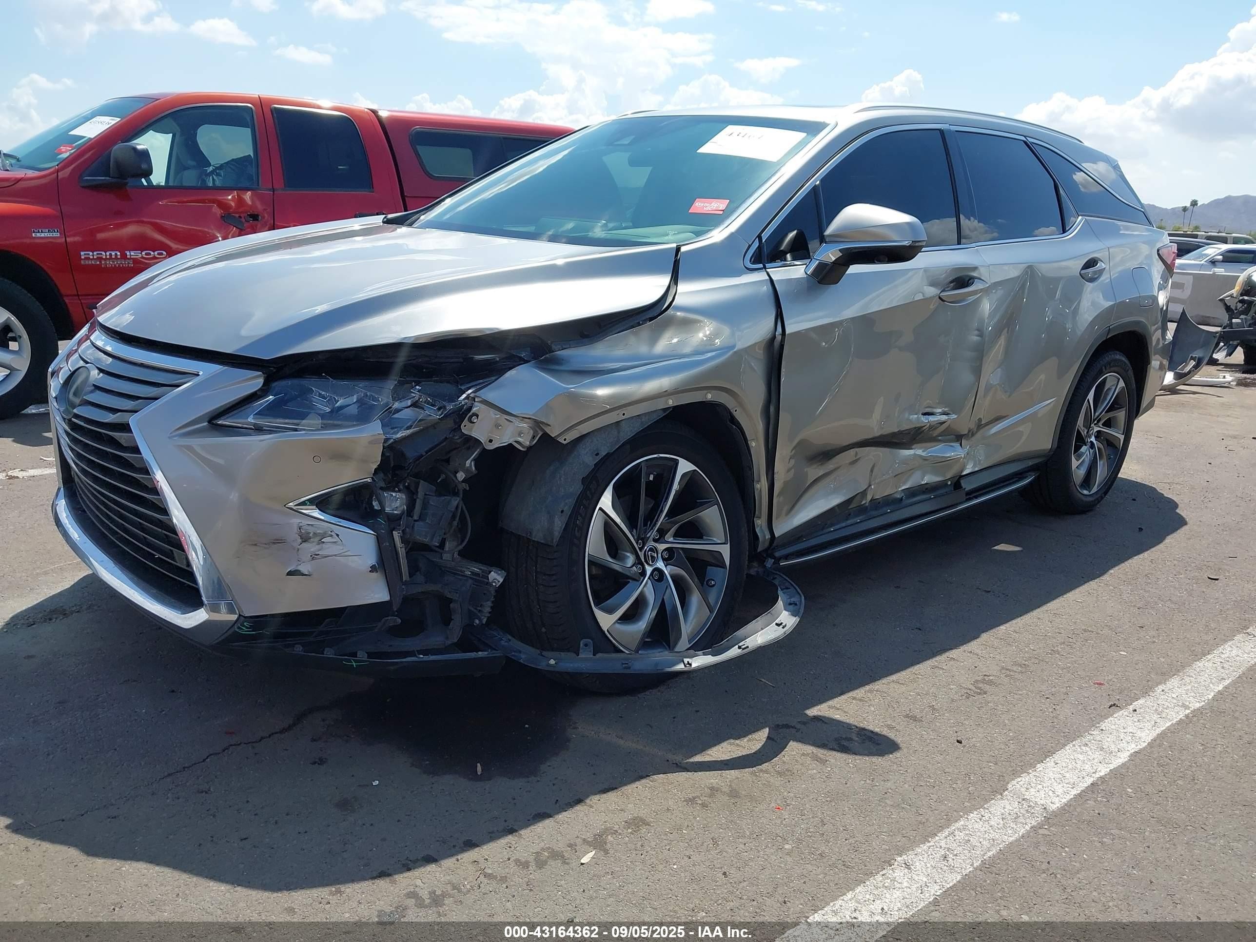 2019 Lexus RX 350L VIN JTJGZKCA2K2011851 IAAI salvage auction — Unknown, Salvage (Arizona), sold $10,100 on 2026-07-11 (photo 2)