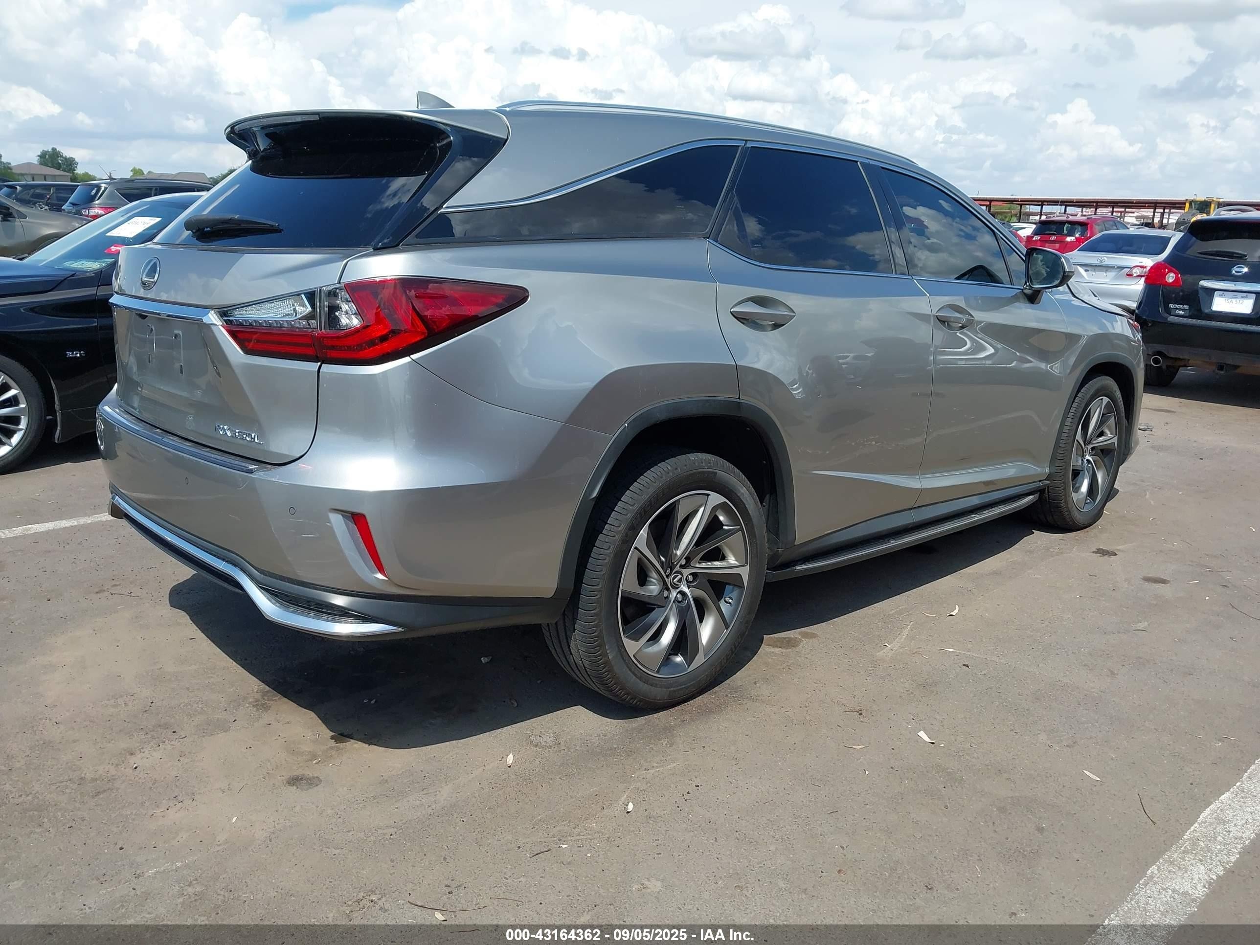 2019 Lexus RX 350L VIN JTJGZKCA2K2011851 IAAI salvage auction — Unknown, Salvage (Arizona), sold $10,100 on 2026-07-11 (photo 4)