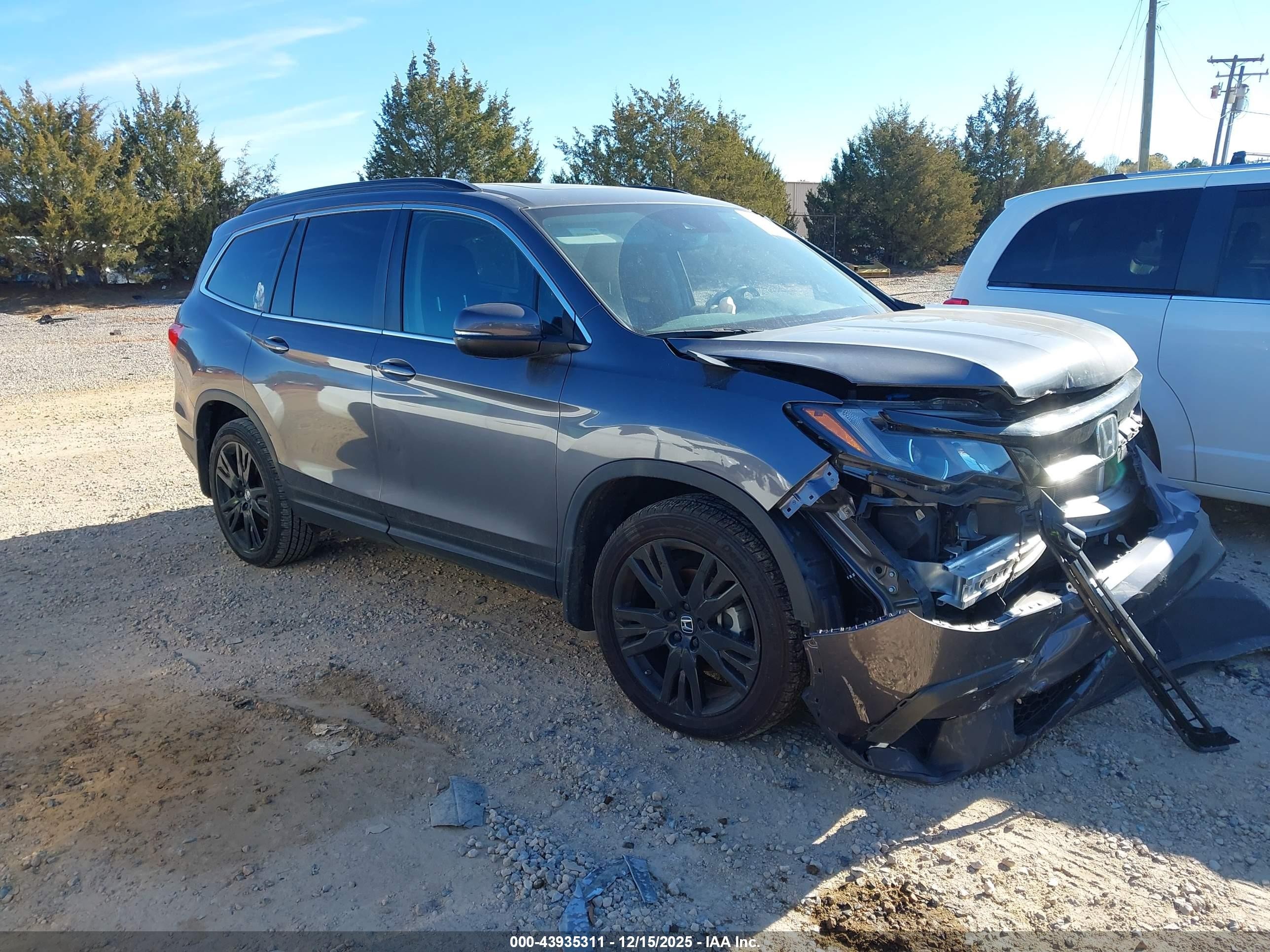 2022 Honda Pilot VIN 5FNYF5H23NB028209 — IAAI salvage auction photo