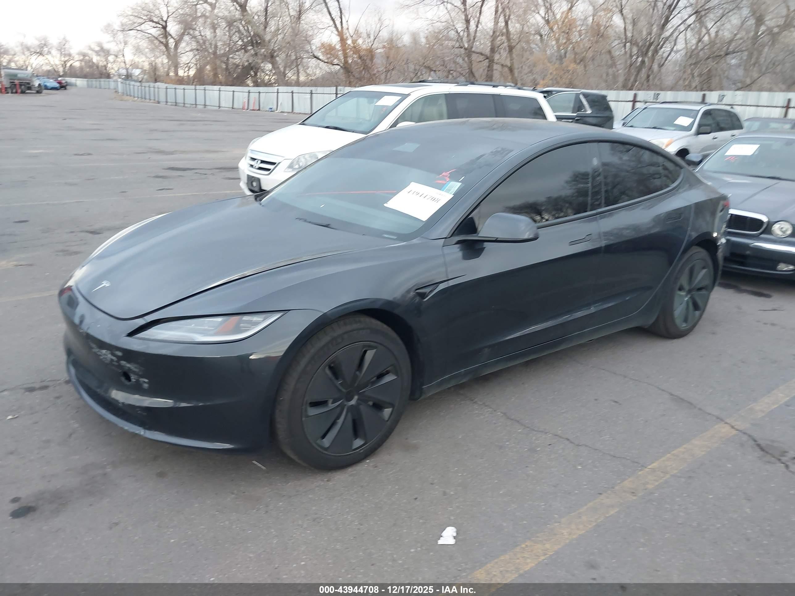 2025 Tesla Model 3 VIN 5YJ3E1EA8SF872243 IAAI salvage auction — Front & Rear, Clear (Montana), sold $17,100 on 2026-07-09 (photo 2)