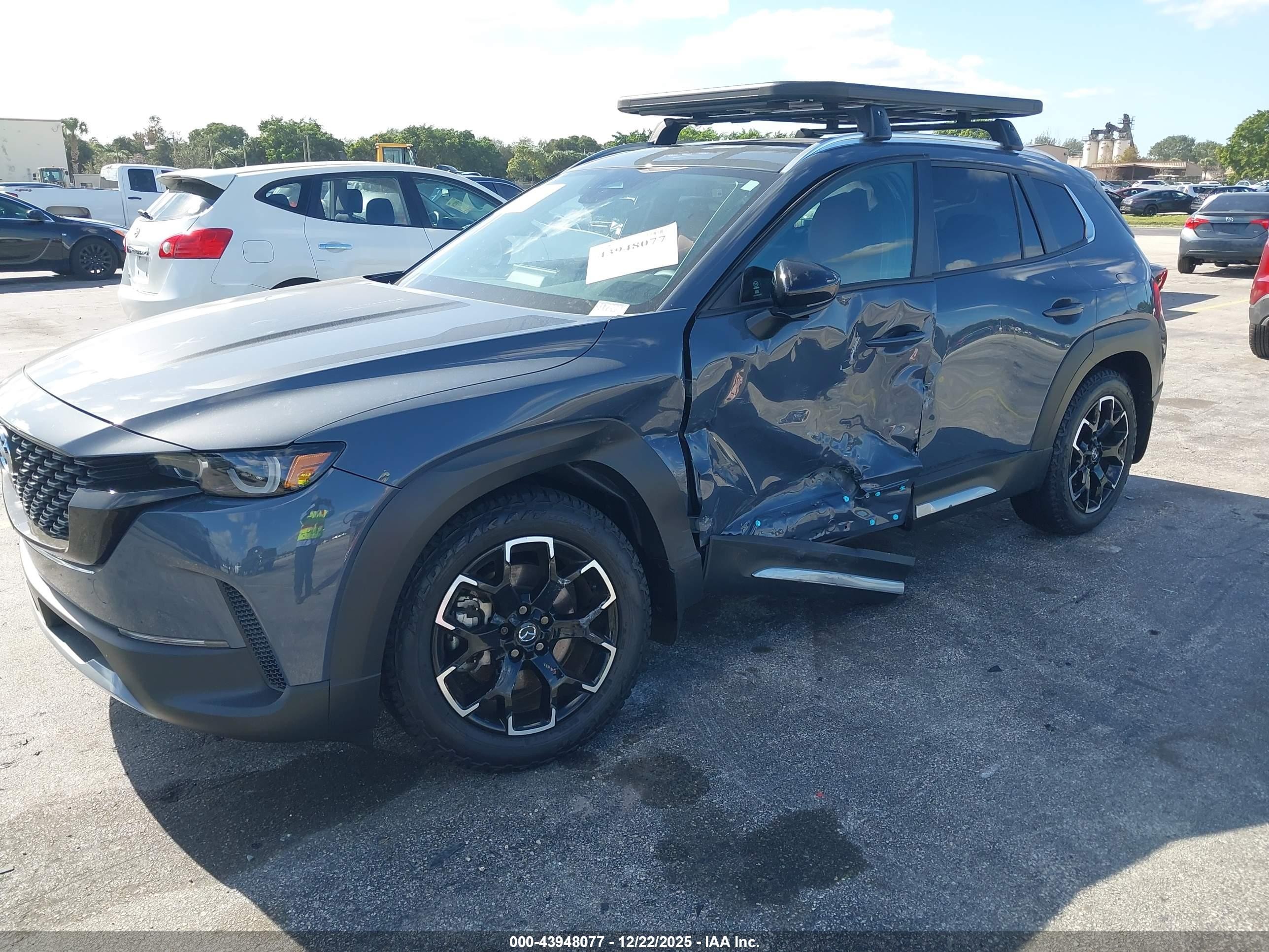 2025 Mazda CX-50 VIN 7MMVABXY9SN317209 IAAI salvage auction — Side, Rebuildable (Florida), sold $11,100 on 2026-07-10 (photo 2)