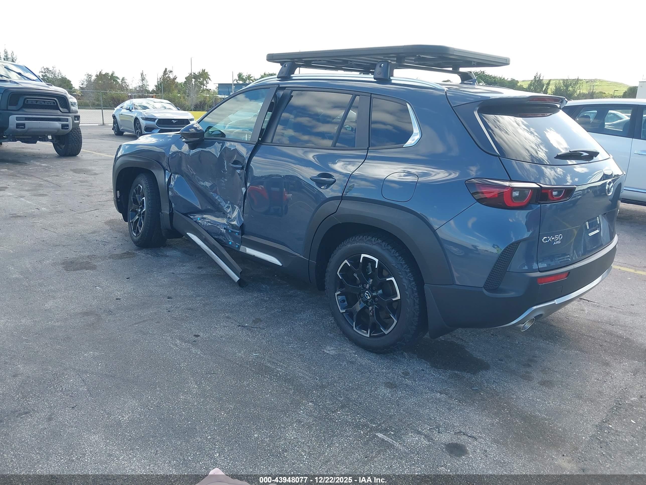 2025 Mazda CX-50 VIN 7MMVABXY9SN317209 IAAI salvage auction — Side, Rebuildable (Florida), sold $11,100 on 2026-07-10 (photo 3)