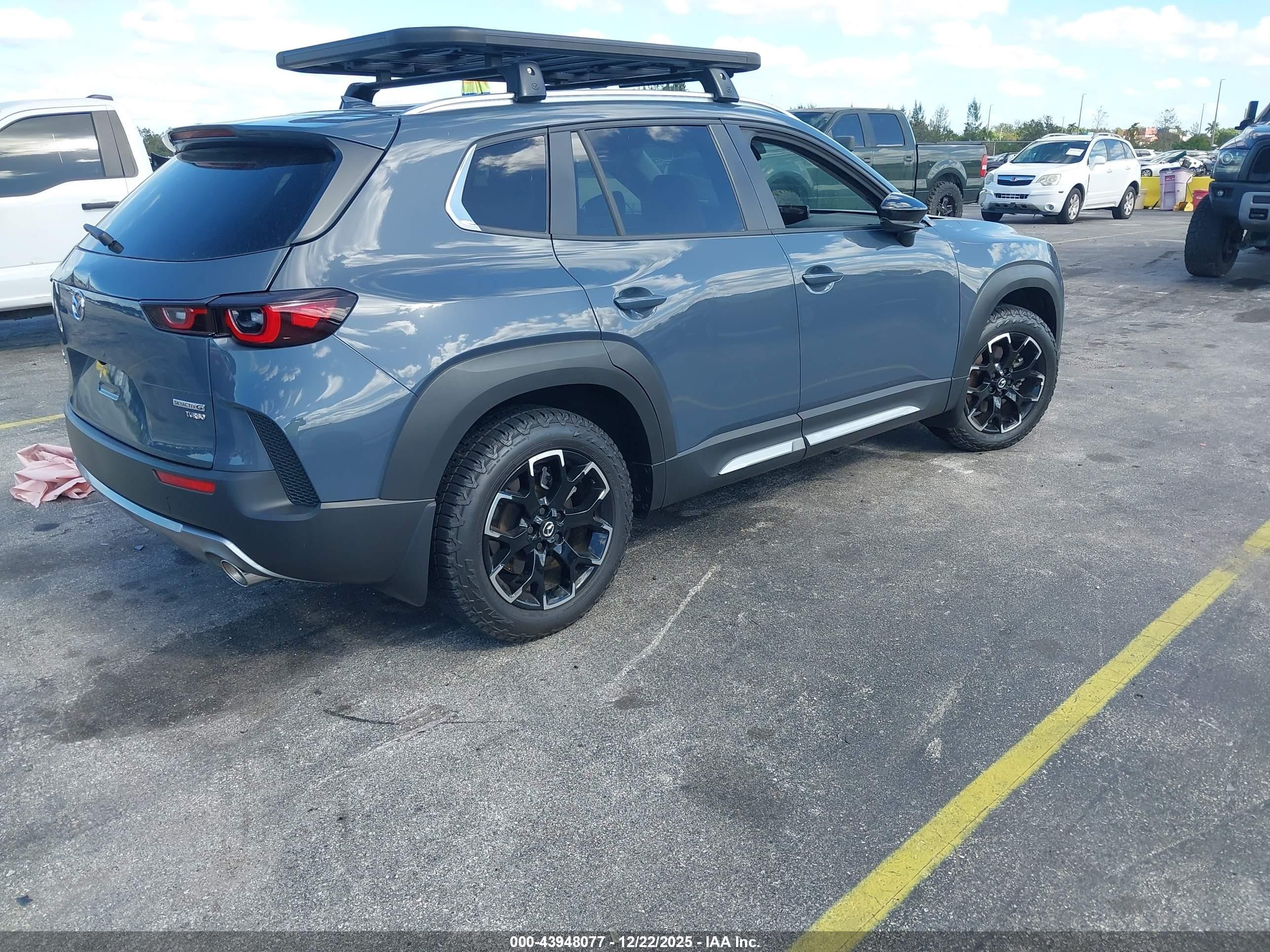 2025 Mazda CX-50 VIN 7MMVABXY9SN317209 IAAI salvage auction — Side, Rebuildable (Florida), sold $11,100 on 2026-07-10 (photo 4)