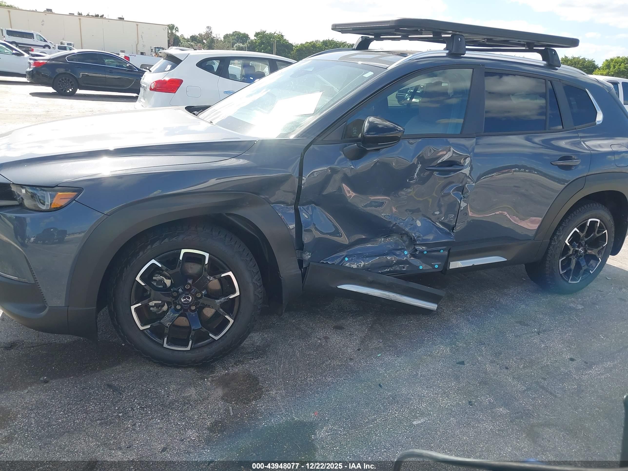 2025 Mazda CX-50 VIN 7MMVABXY9SN317209 IAAI salvage auction — Side, Rebuildable (Florida), sold $11,100 on 2026-07-10 (photo 6)