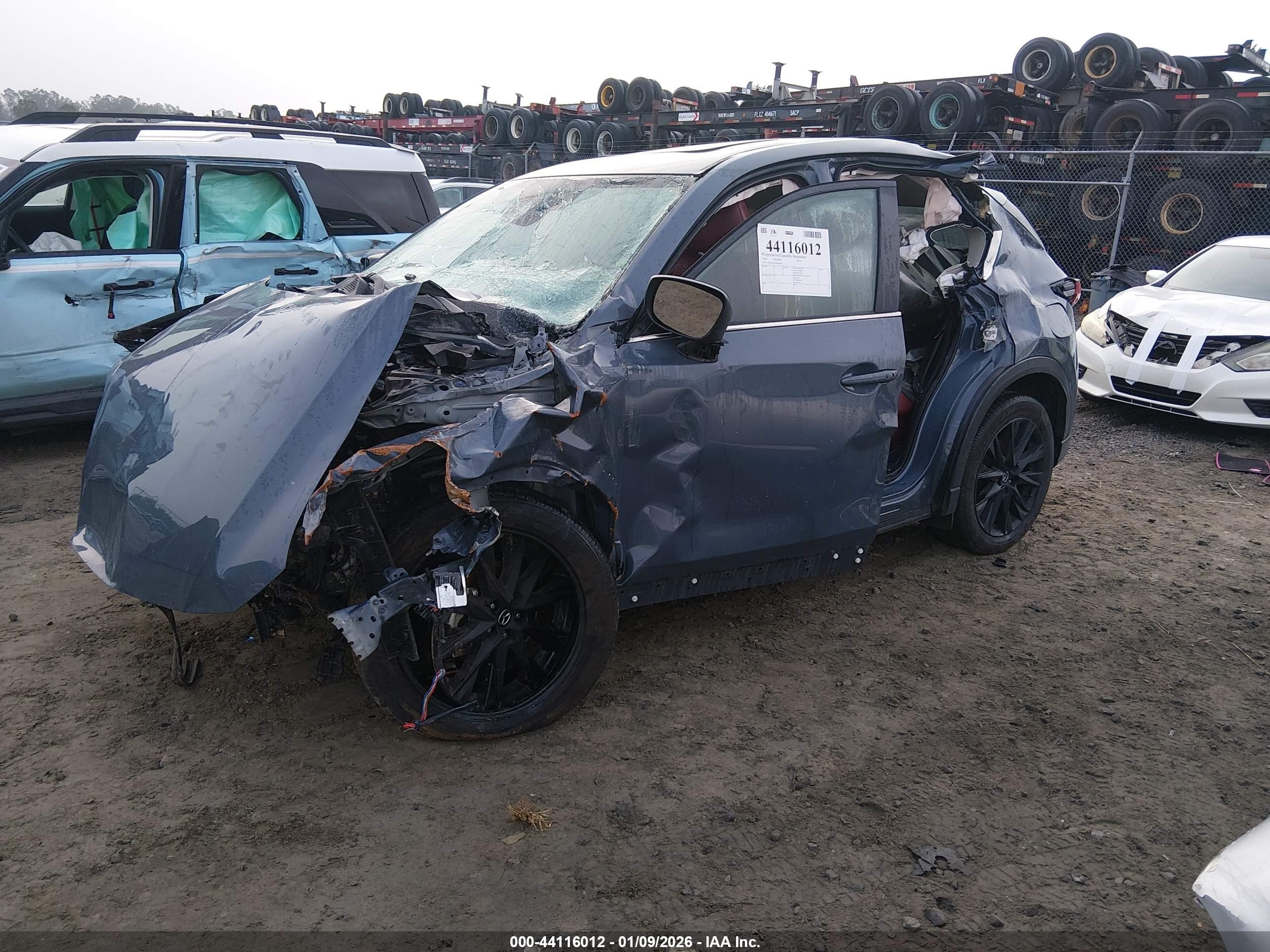 2024 Mazda CX-5 VIN JM3KFBCL9R0470833 IAAI salvage auction — Side, Salvage (Georgia), sold $450 on 2026-07-01 (photo 2)