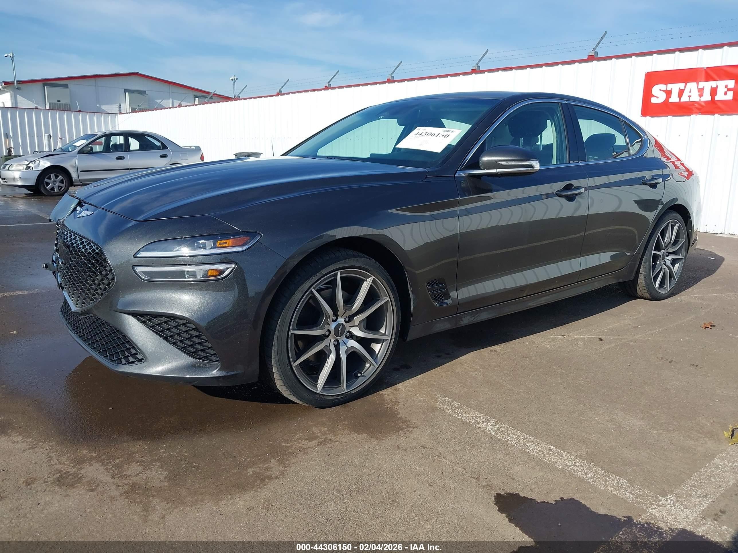 2023 Genesis G70 VIN KMTG34TA9PU128260 IAAI salvage auction — Side, Salvage (Oregon), sold $5,900 on 2026-09-24 (photo 2)