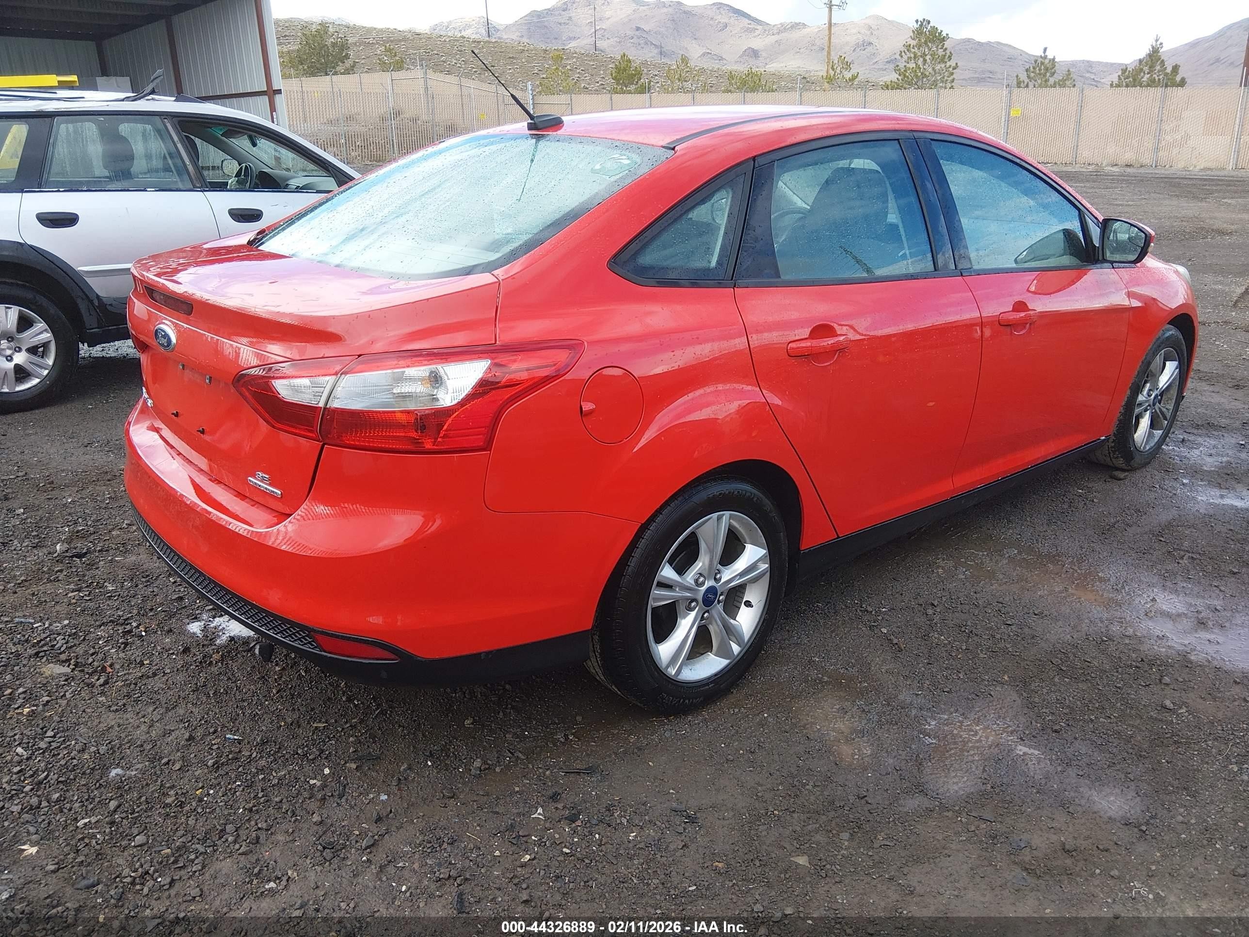 2014 Ford Focus VIN 1FADP3F23EL192887 IAAI salvage auction — Rear End, Salvage (Nevada), sold $900 on 2026-07-11 (photo 4)