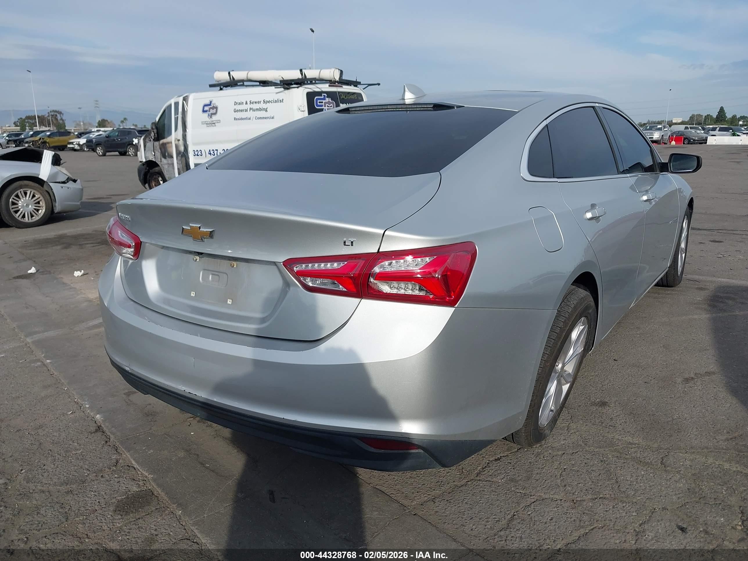 2019 Chevrolet Malibu Limited VIN 1G1ZD5ST3KF104278 IAAI salvage auction — Side, Salvage (California), sold $2,425 on 2026-07-06 (photo 4)