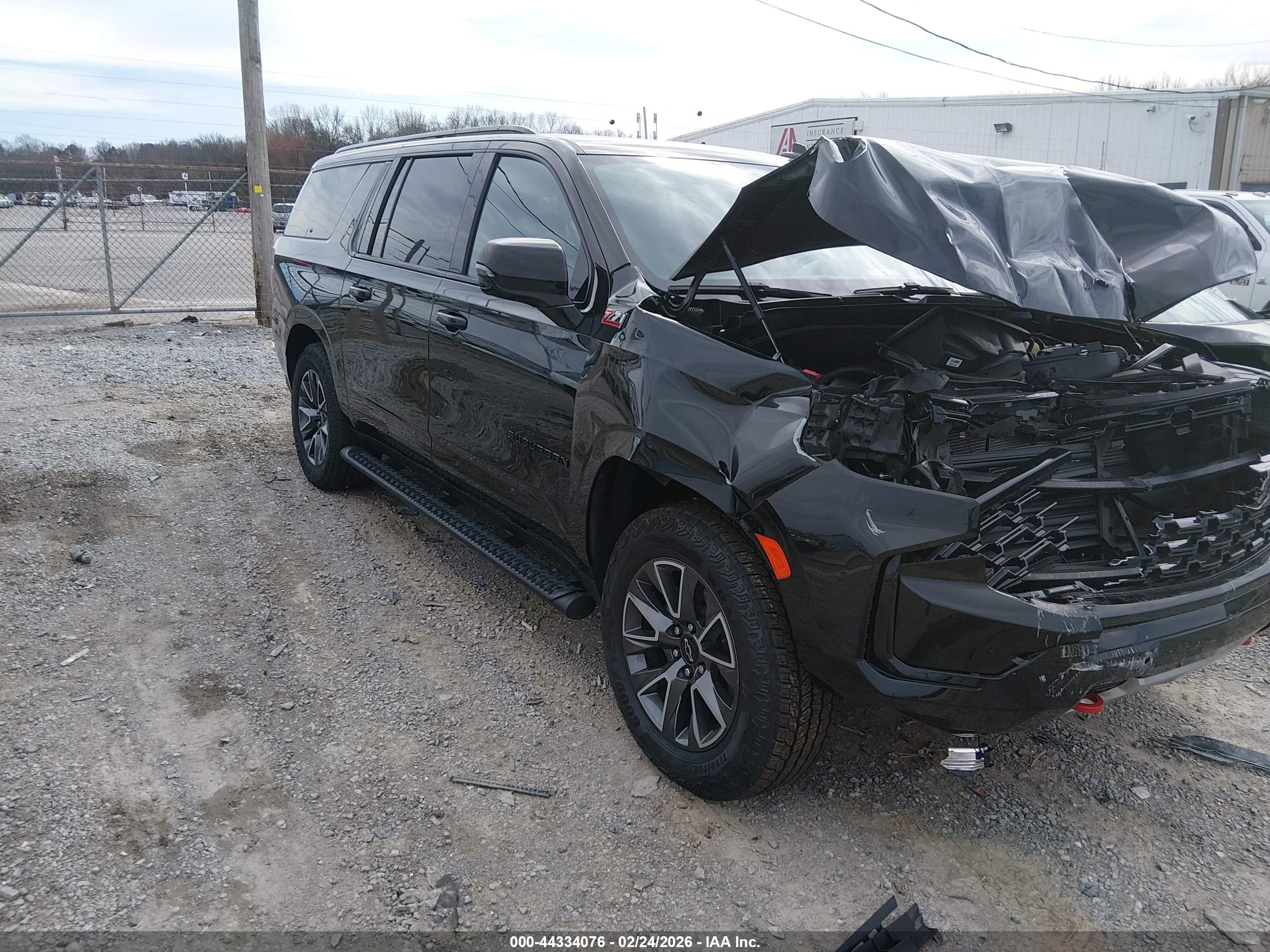 2023 Chevrolet Suburban VIN 1GNSKDKD6PR287299 — IAAI salvage auction photo