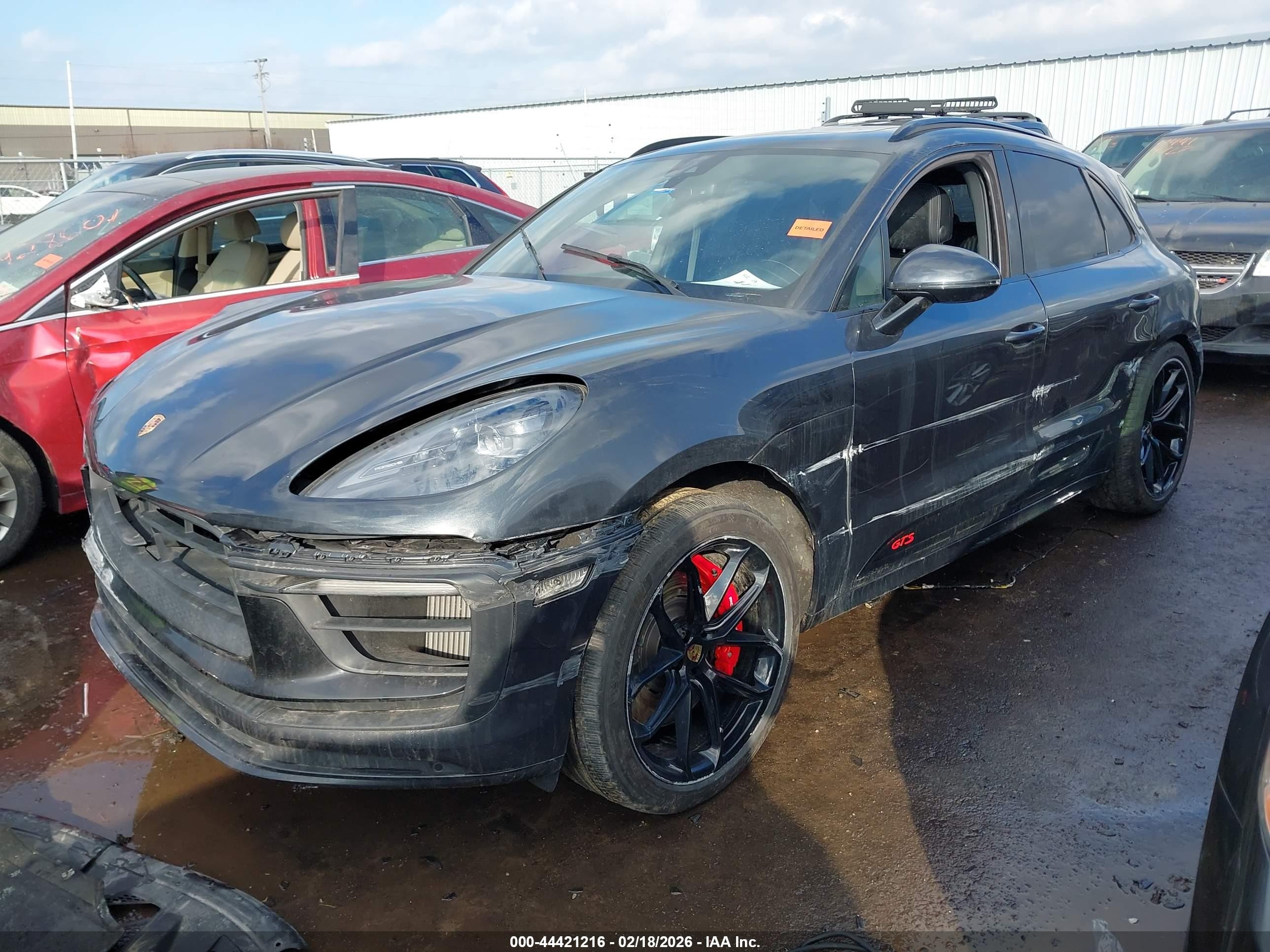 2024 Porsche Macan VIN WP1AF2A58RLB56919 IAAI salvage auction — Side, Salvage (Illinois), sold $26,075 on 2026-08-11 (photo 2)