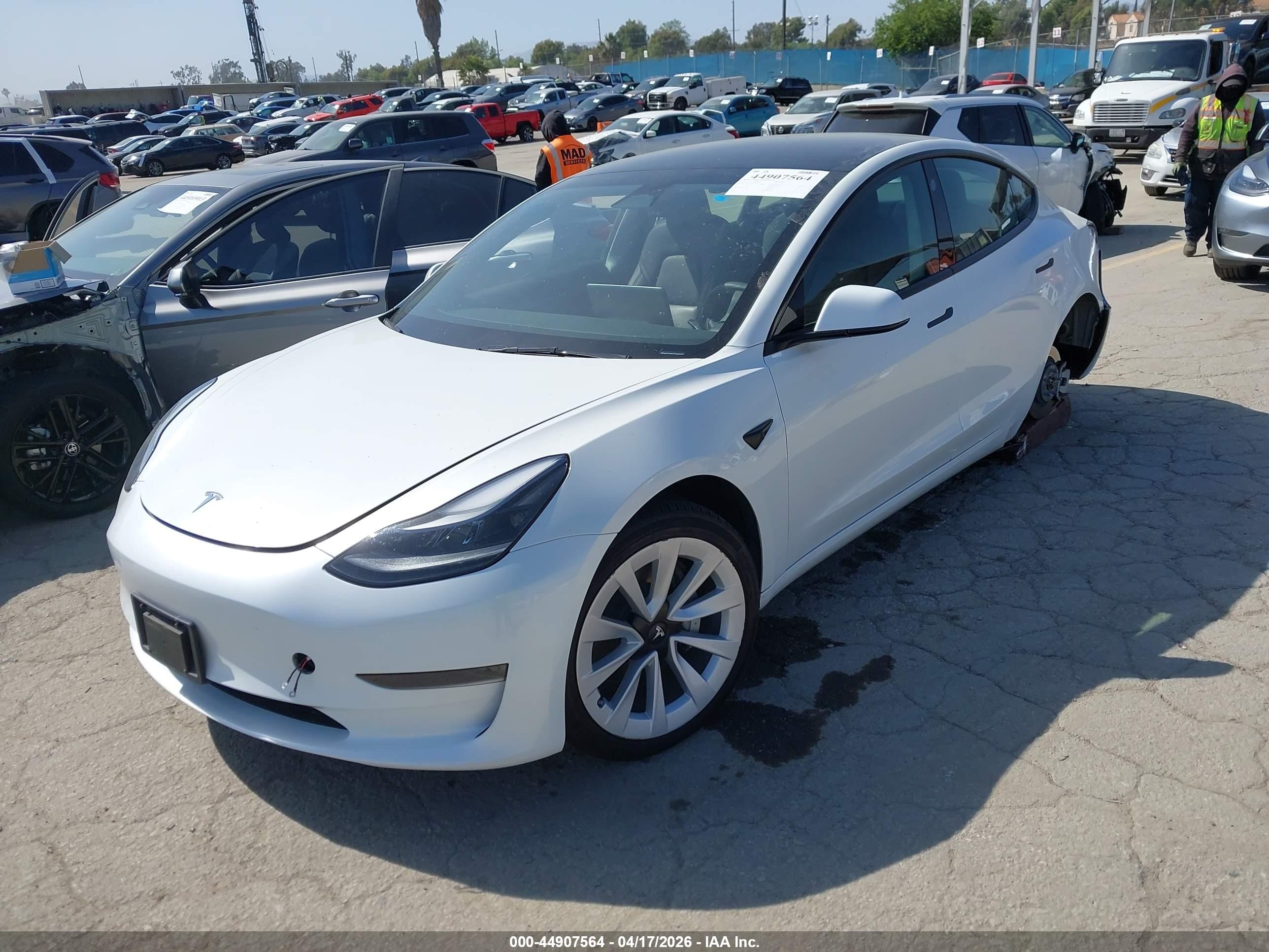 2023 Tesla Model 3 VIN 5YJ3E1EA6PF669391 IAAI salvage auction — Rear End, Salvage (California), sold $7,600 on 2026-09-11 (photo 2)