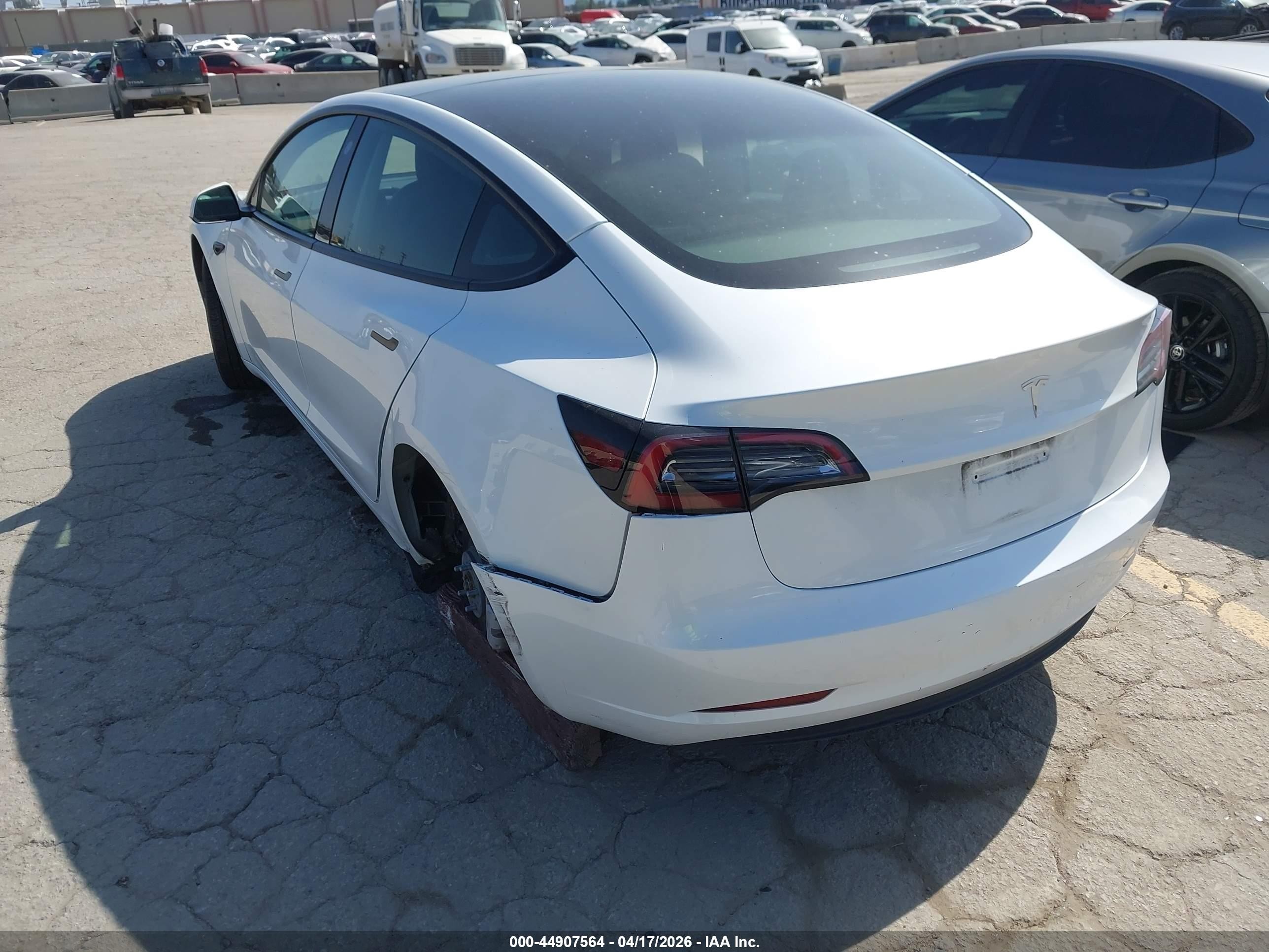 2023 Tesla Model 3 VIN 5YJ3E1EA6PF669391 IAAI salvage auction — Rear End, Salvage (California), sold $7,600 on 2026-09-11 (photo 3)