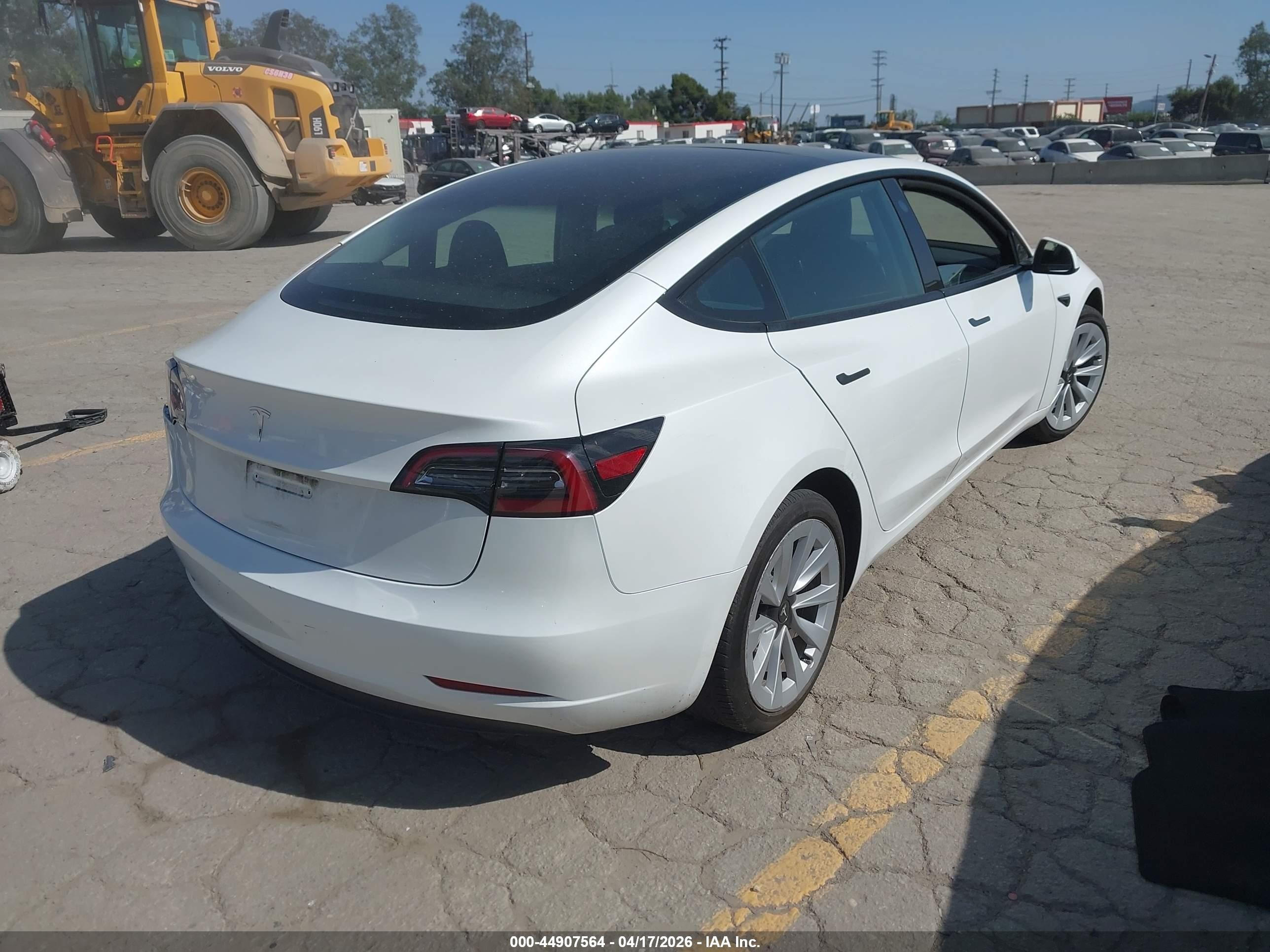 2023 Tesla Model 3 VIN 5YJ3E1EA6PF669391 IAAI salvage auction — Rear End, Salvage (California), sold $7,600 on 2026-09-11 (photo 4)