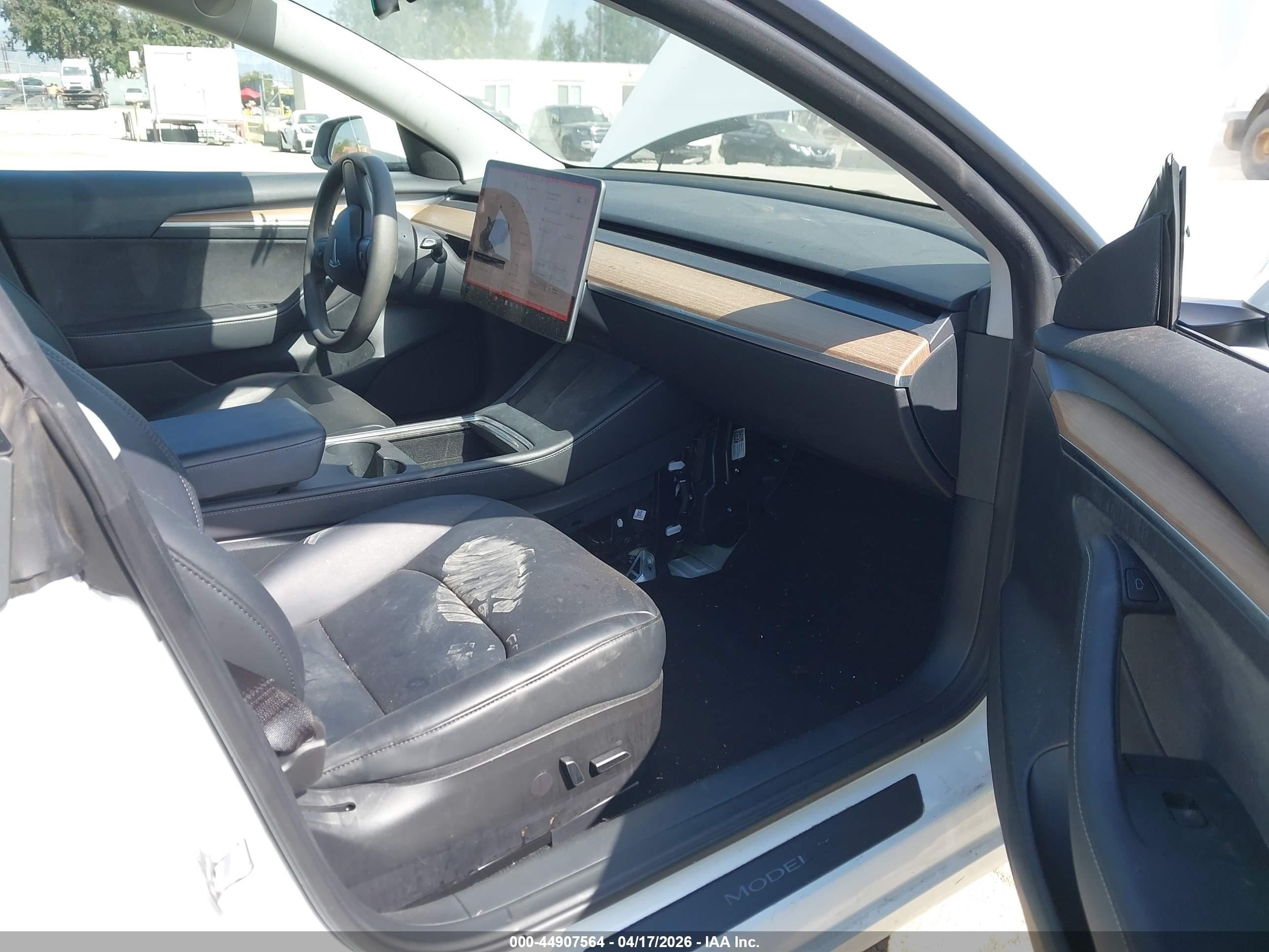 2023 Tesla Model 3 VIN 5YJ3E1EA6PF669391 IAAI salvage auction — Rear End, Salvage (California), sold $7,600 on 2026-09-11 (photo 5)