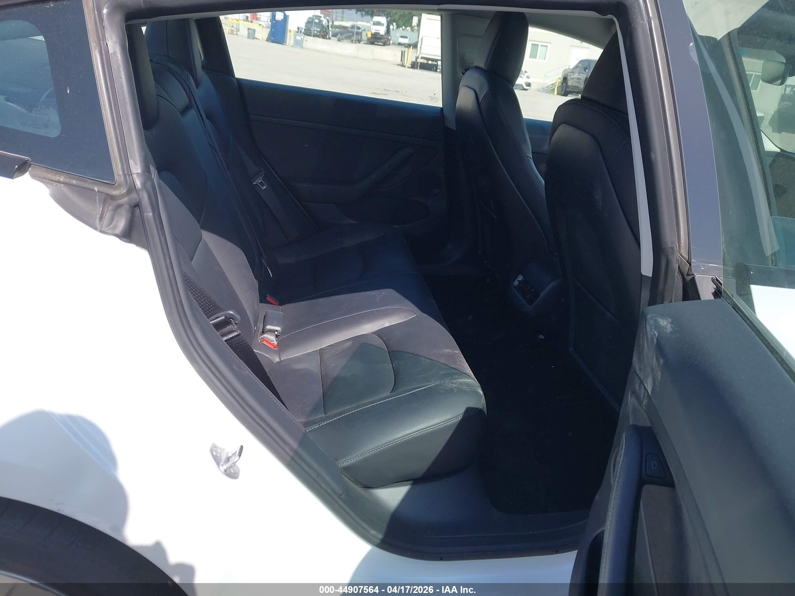 2023 Tesla Model 3 VIN 5YJ3E1EA6PF669391 IAAI salvage auction — Rear End, Salvage (California), sold $7,600 on 2026-09-11 (photo 8)