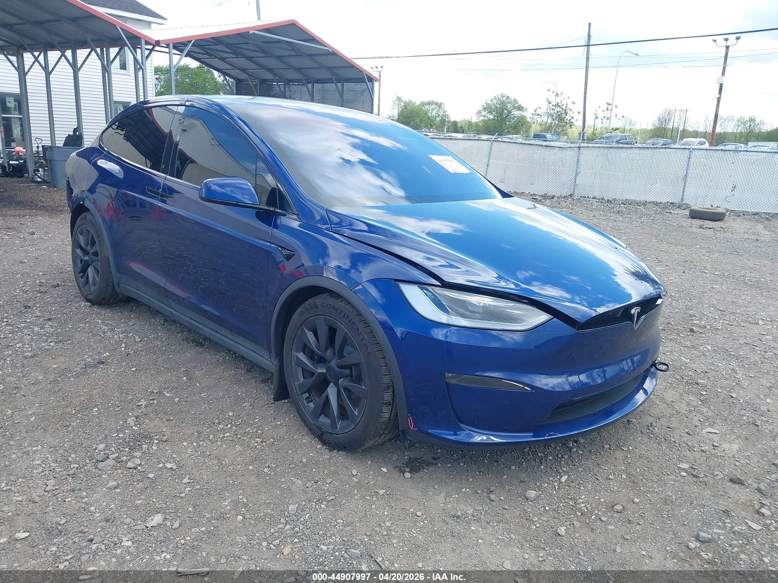 2025 Tesla Model X VIN 7SAXCAE50SF472545 — IAAI salvage auction photo