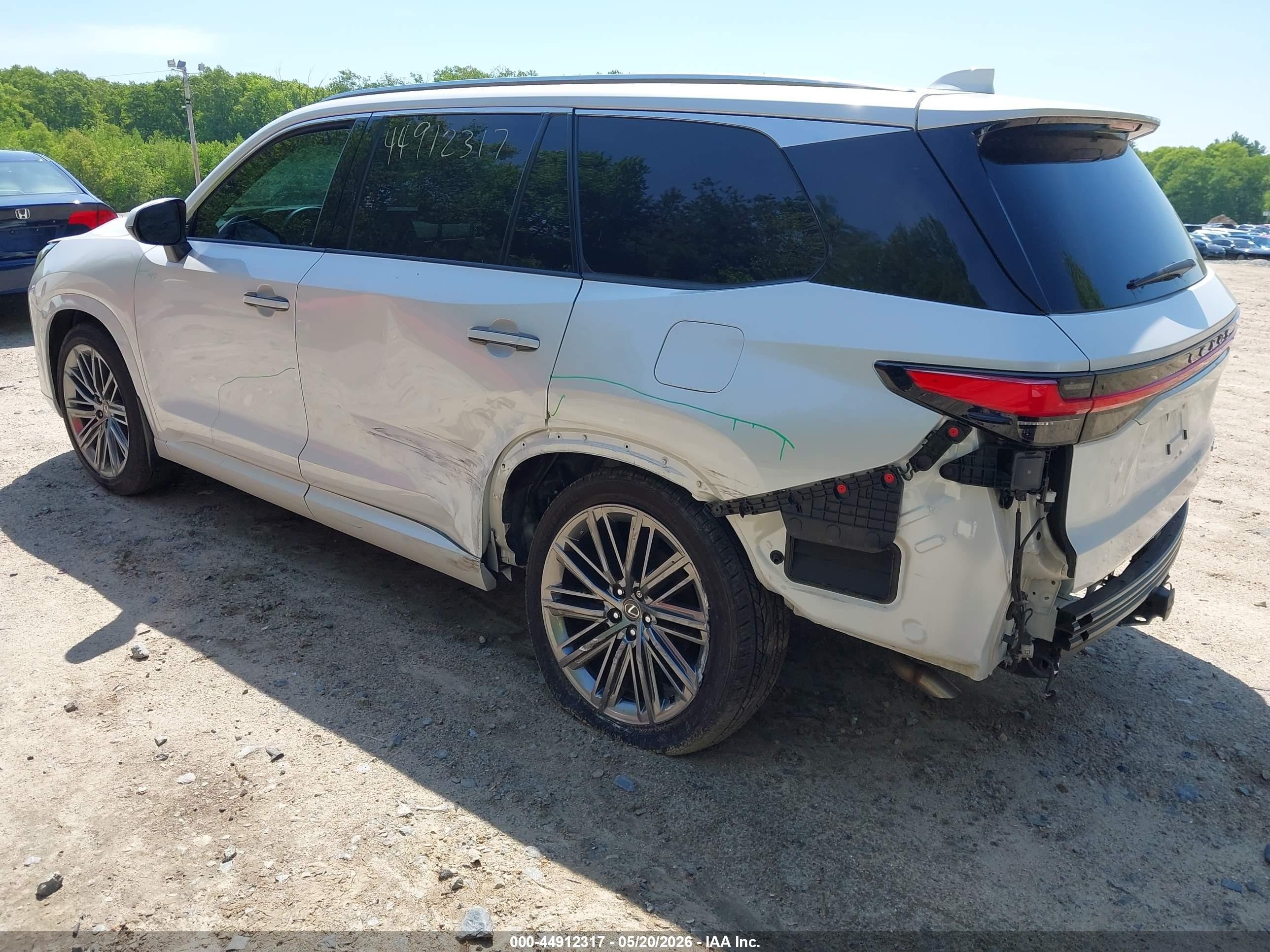 2024 Lexus Tx VIN 5TDAAAB61RS005016 IAAI salvage auction — Side, Salvage (Massachusetts), sold $28,500 on 2026-08-21 (photo 3)