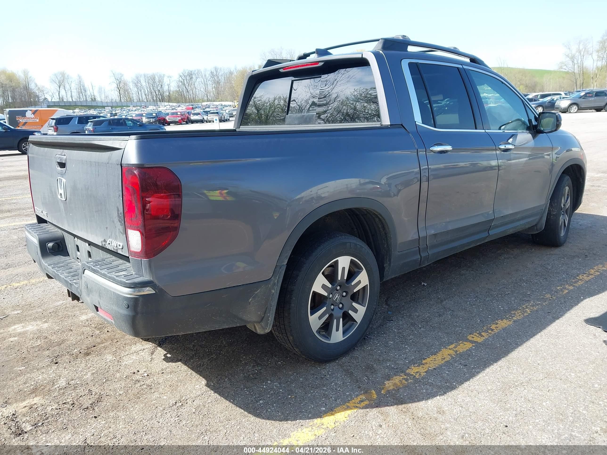 2019 Honda Ridgeline VIN 5FPYK3F71KB036682 IAAI salvage auction — Side, Clear (Michigan), sold $4,400 on 2026-06-29 (photo 4)