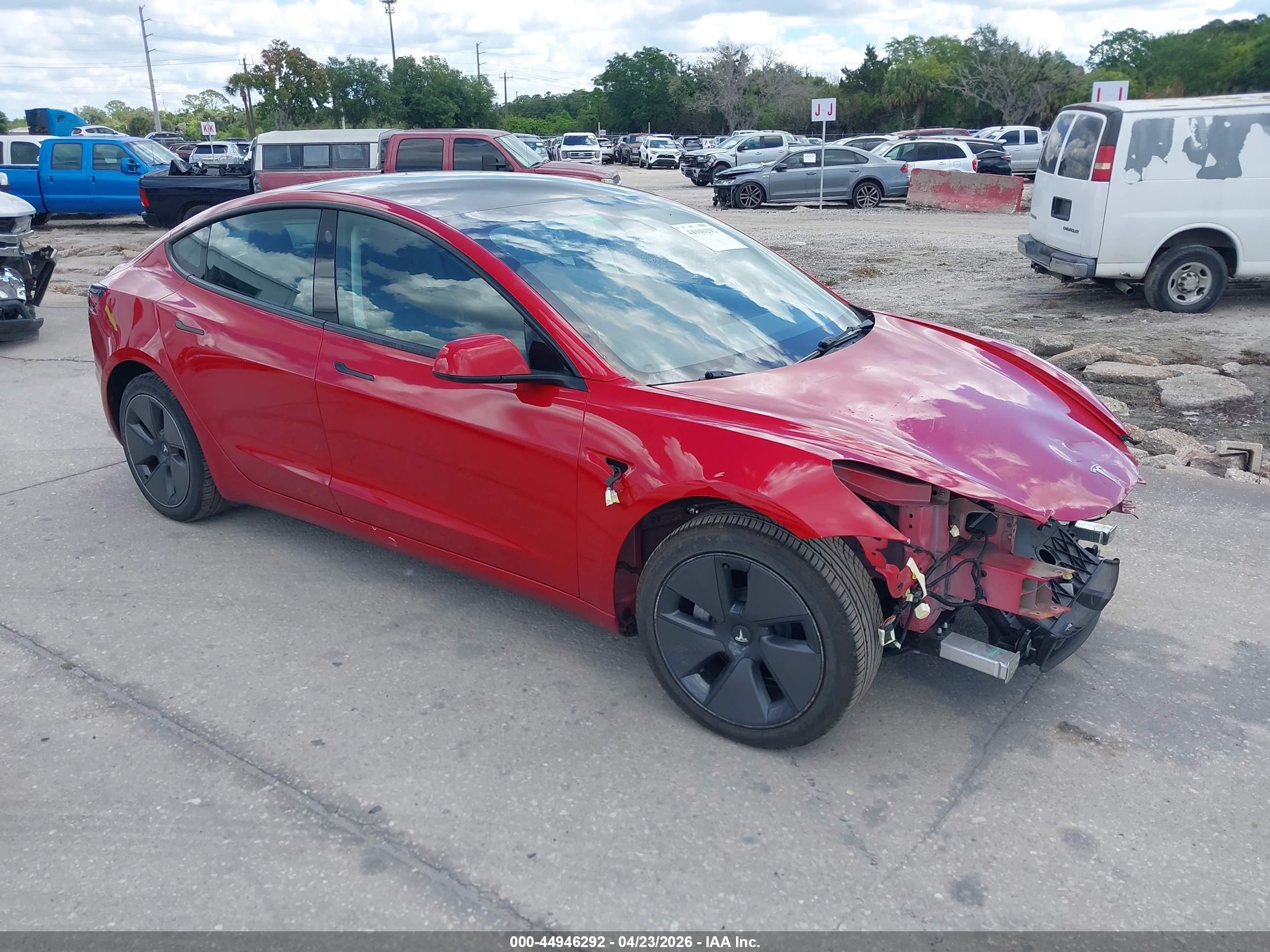 2023 Tesla Model 3 VIN 5YJ3E1EA6PF448325 — IAAI salvage auction photo