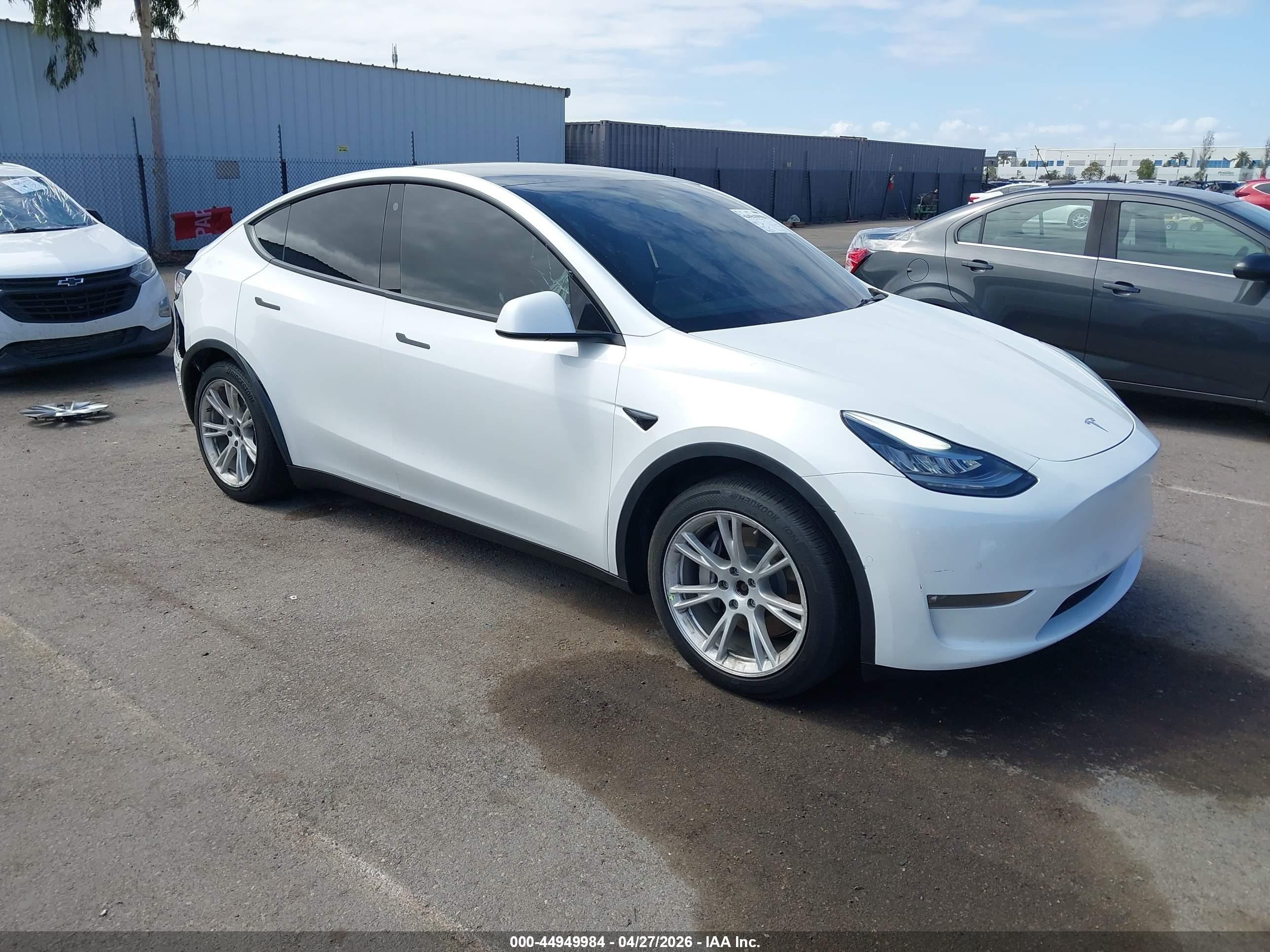 2021 Tesla Model Y VIN 5YJYGAEE4MF144831 — IAAI salvage auction photo
