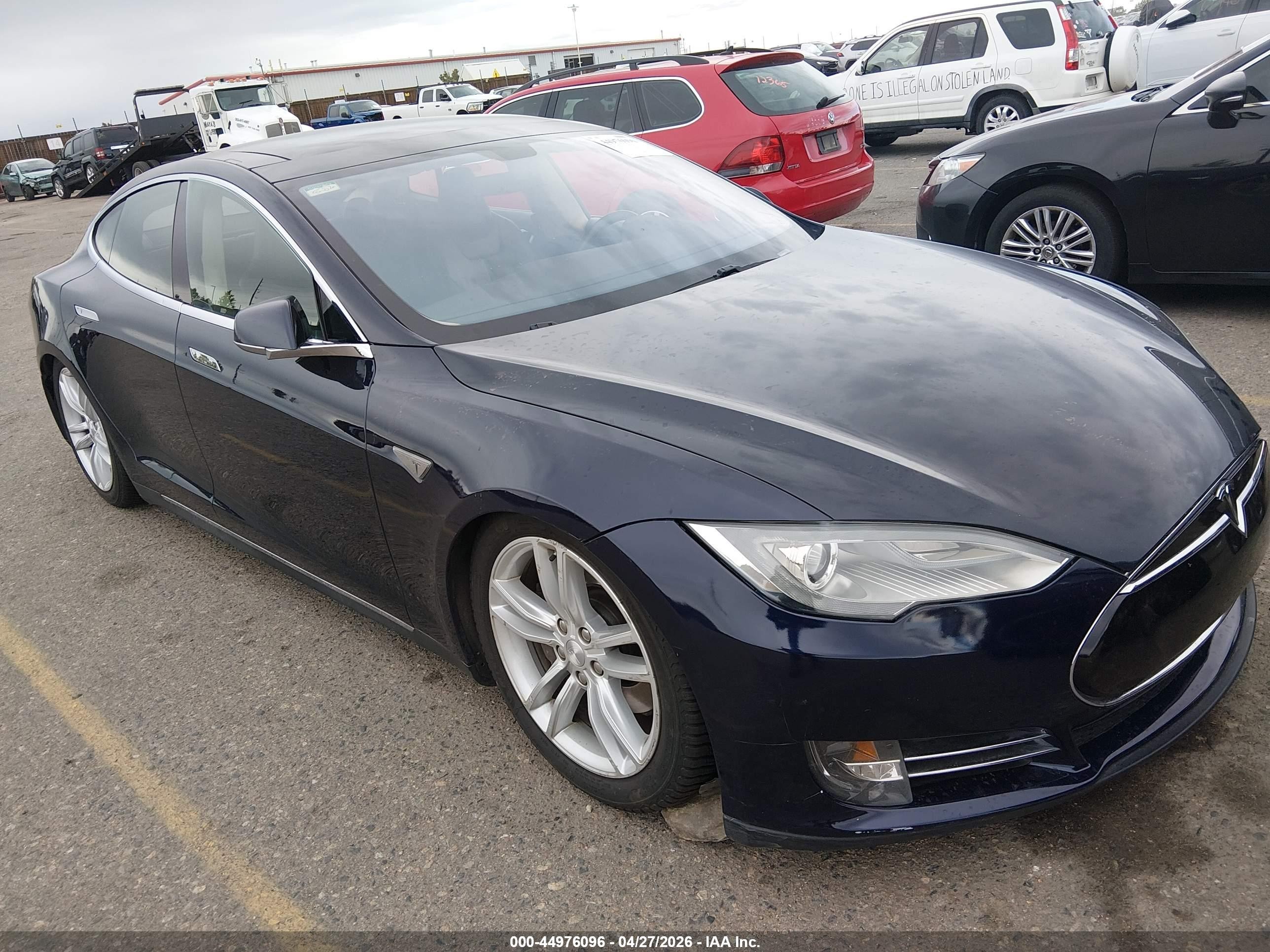 2013 Tesla Model S VIN 5YJSA1CG9DFP03818 IAAI salvage auction — Normal Wear, Clear (Colorado), sold $1,500 on 2026-06-30 (photo 1)