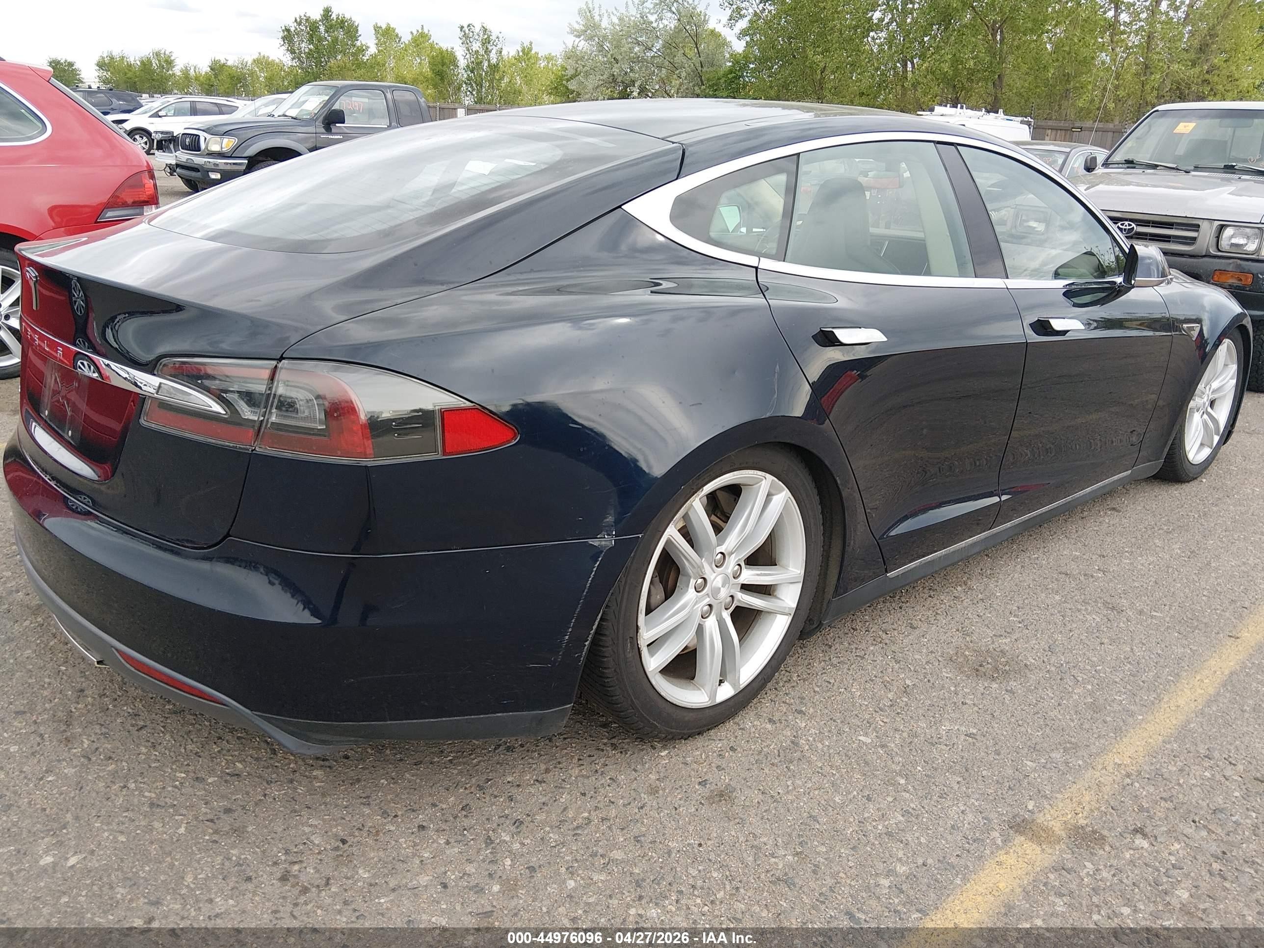 2013 Tesla Model S VIN 5YJSA1CG9DFP03818 IAAI salvage auction — Normal Wear, Clear (Colorado), sold $1,500 on 2026-06-30 (photo 4)