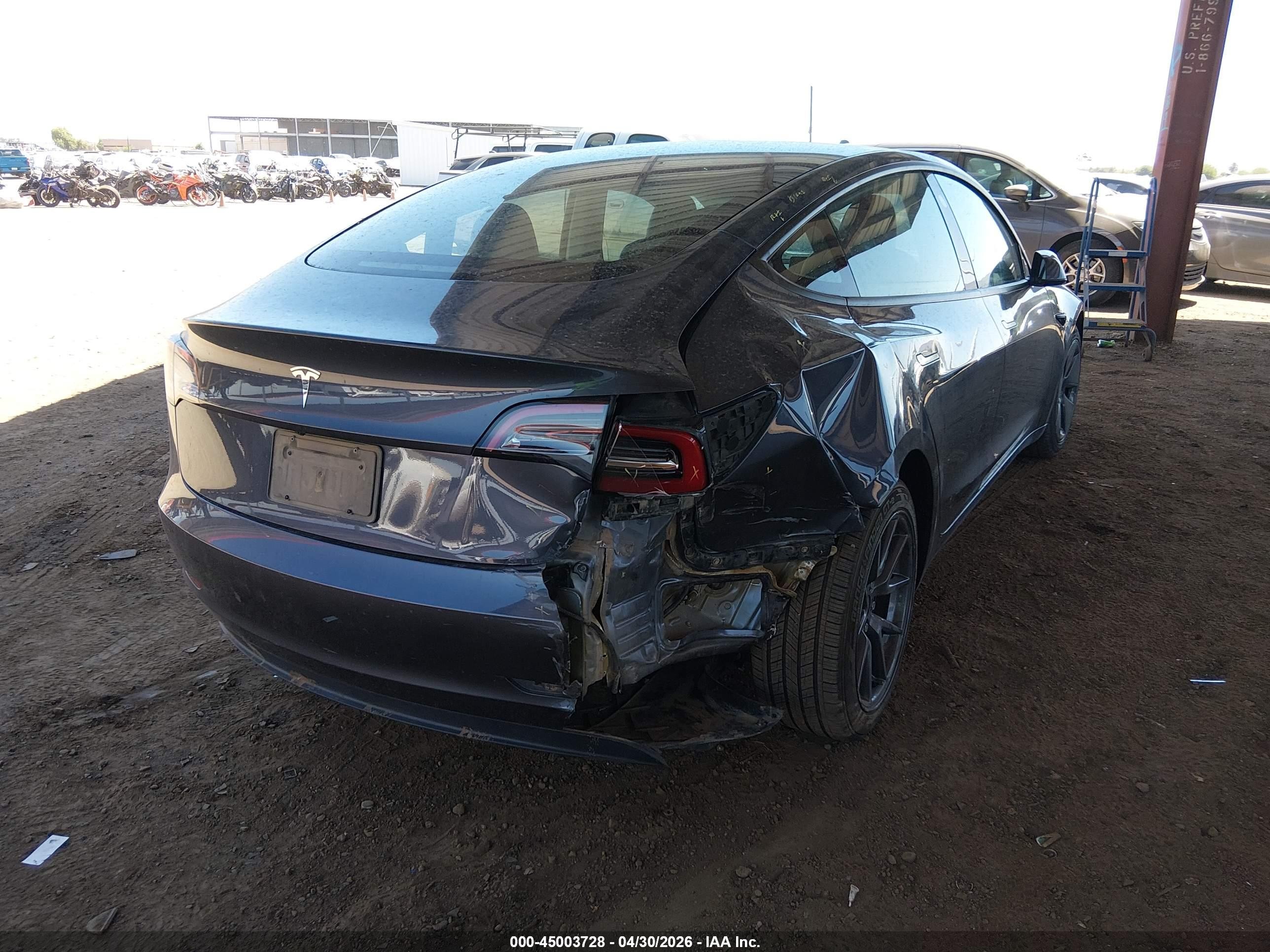 2023 Tesla Model 3 VIN 5YJ3E1EA0PF700747 IAAI salvage auction — Rear End, Salvage (Arizona), sold $7,650 on 2026-09-03 (photo 4)