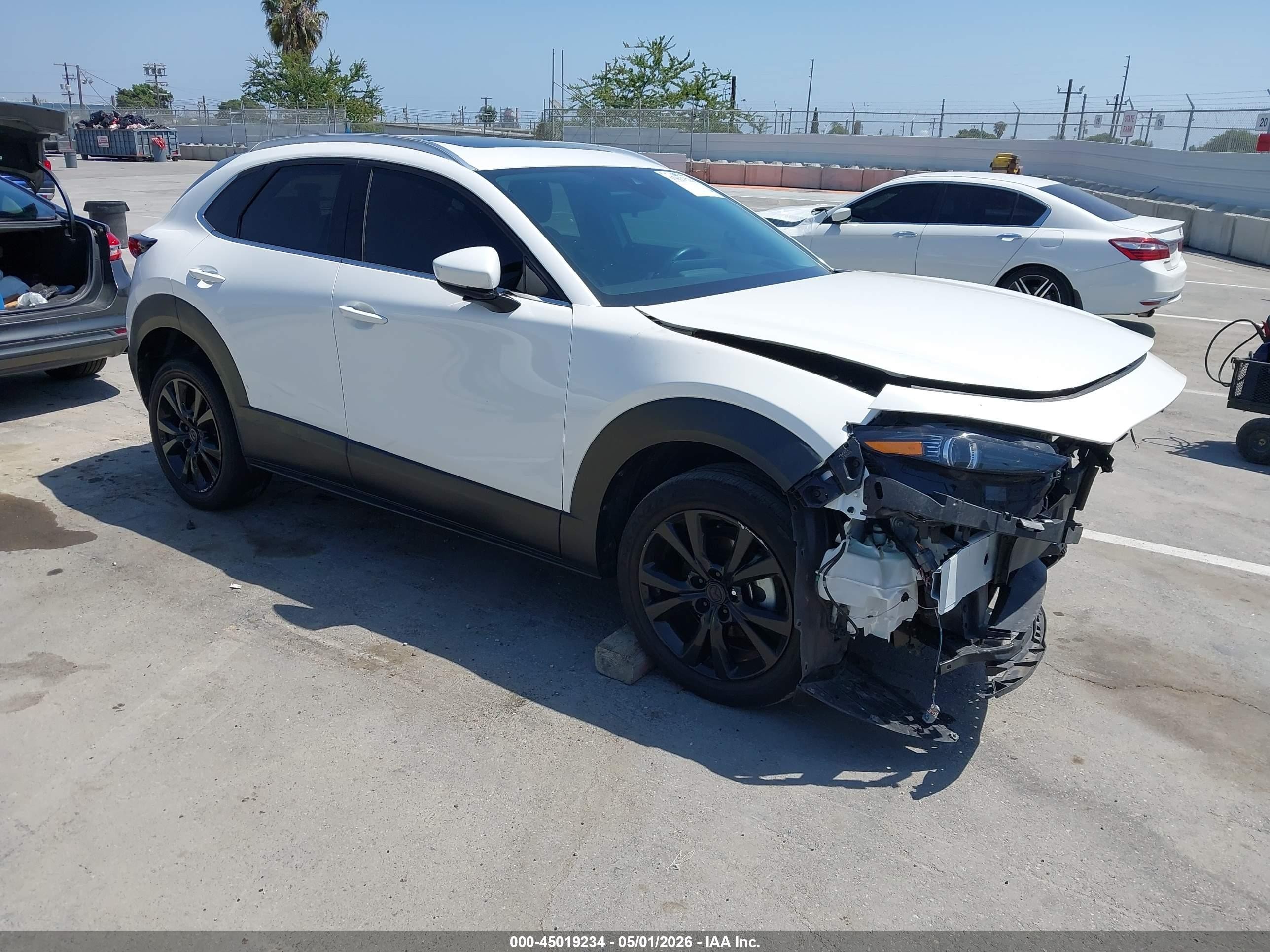 2021 Mazda CX-30 VIN 3MVDMBDL1MM319897 IAAI salvage auction — Front End, Wait Title, sold $3,100 on 2026-09-20 (photo 1)
