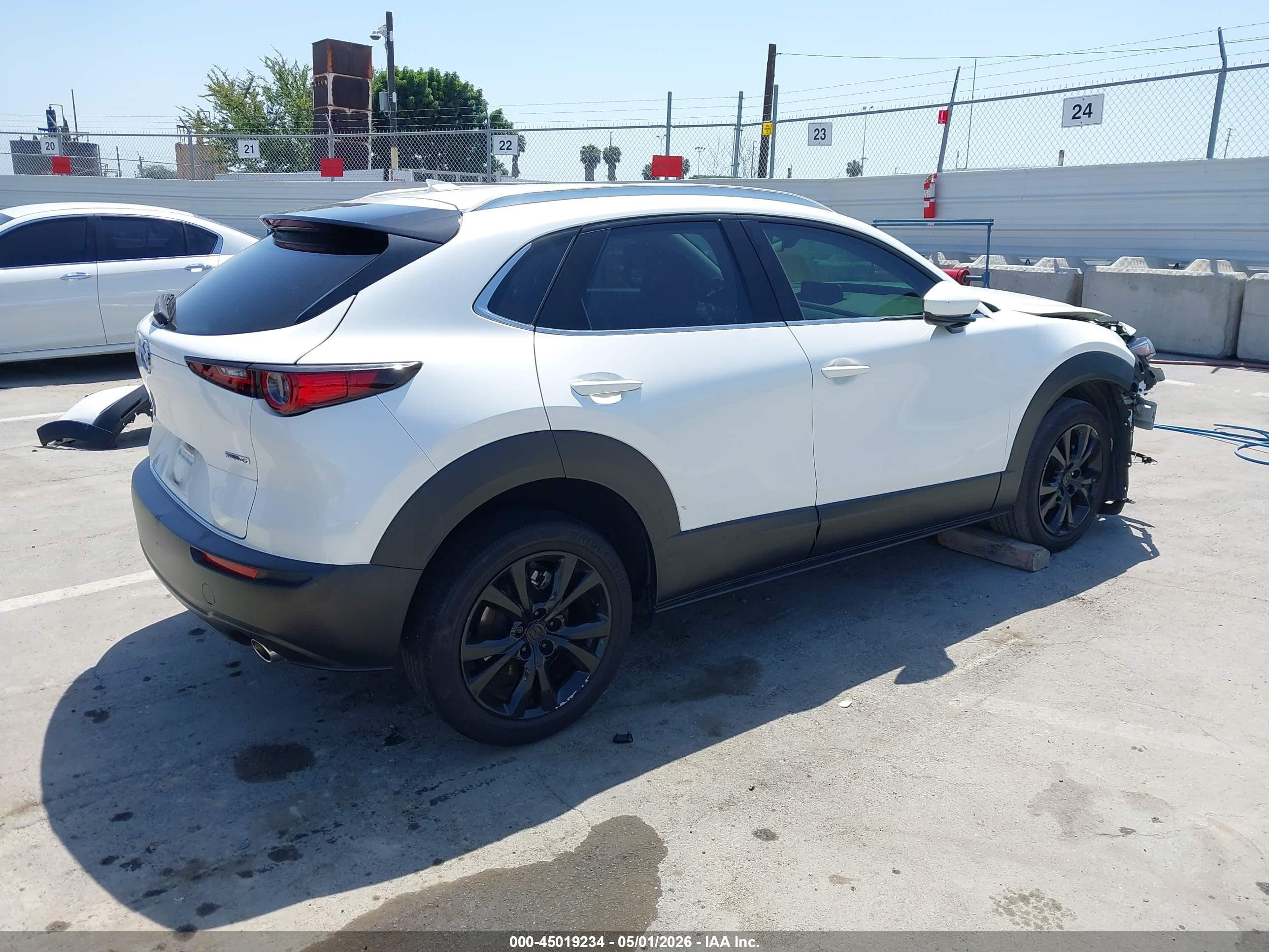 2021 Mazda CX-30 VIN 3MVDMBDL1MM319897 IAAI salvage auction — Front End, Wait Title, sold $3,100 on 2026-09-20 (photo 4)