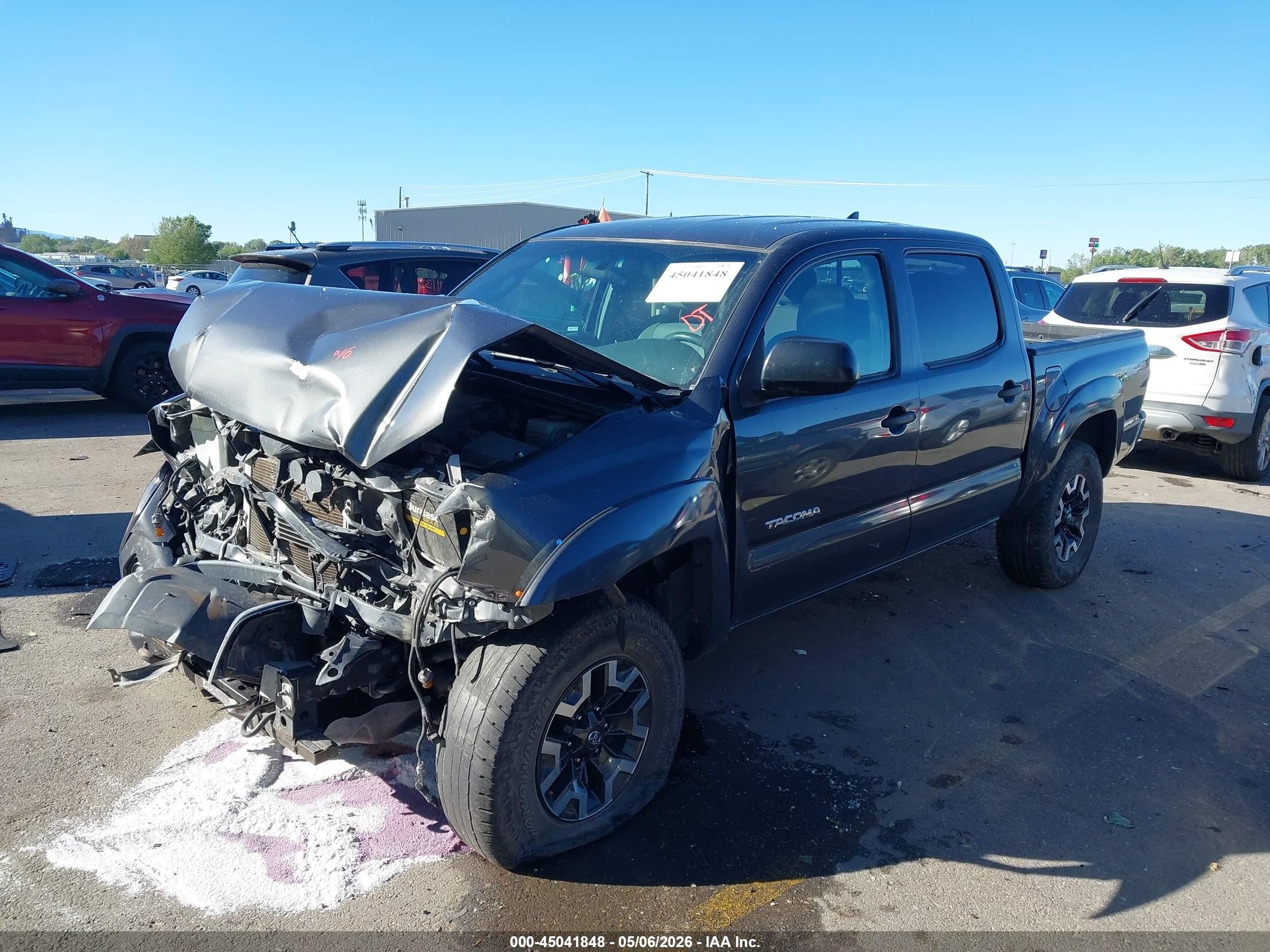 2014 Toyota Tacoma VIN 3TMLU4EN3EM148001 IAAI salvage auction — Front End, Salvage (Utah), sold $4,750 on 2026-07-09 (photo 2)