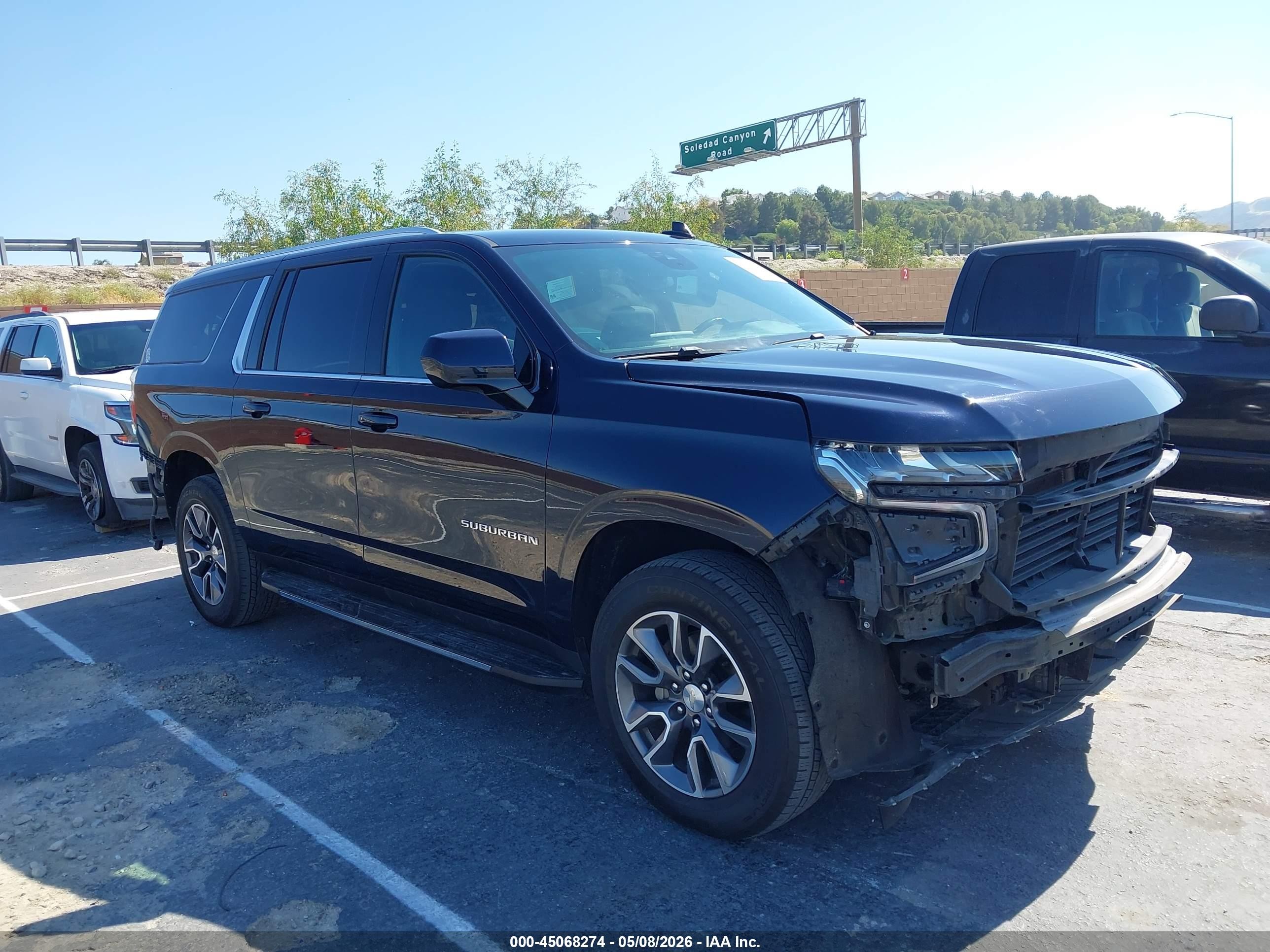 2023 Chevrolet Suburban VIN 1GNSCBKT8PR449247 — IAAI salvage auction photo