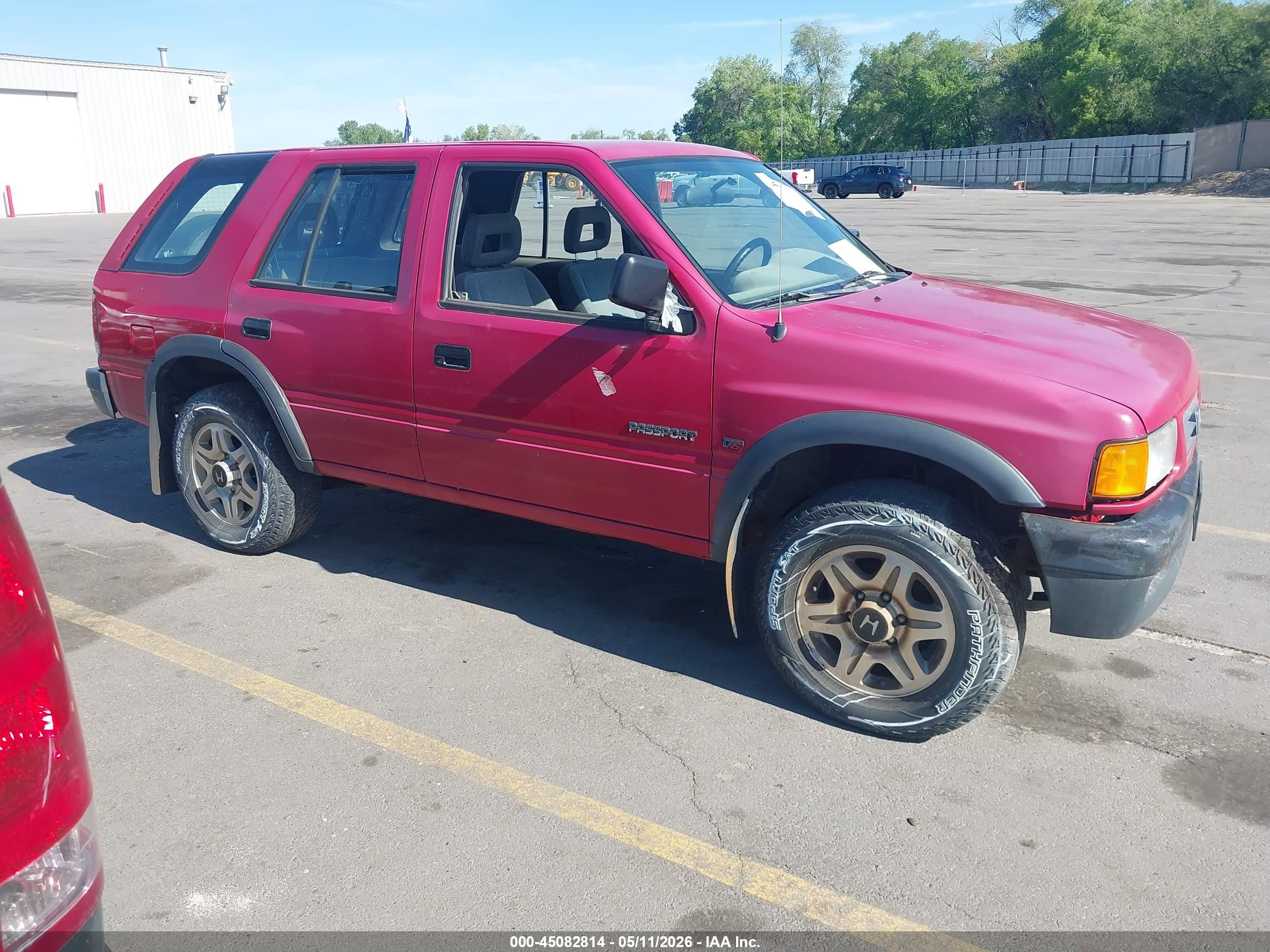 1997 Honda Passport VIN 4S6CM58V8V4400812 IAAI salvage auction — Normal Wear, Clear (Utah), sold $275 on 2026-07-09 (photo 1)