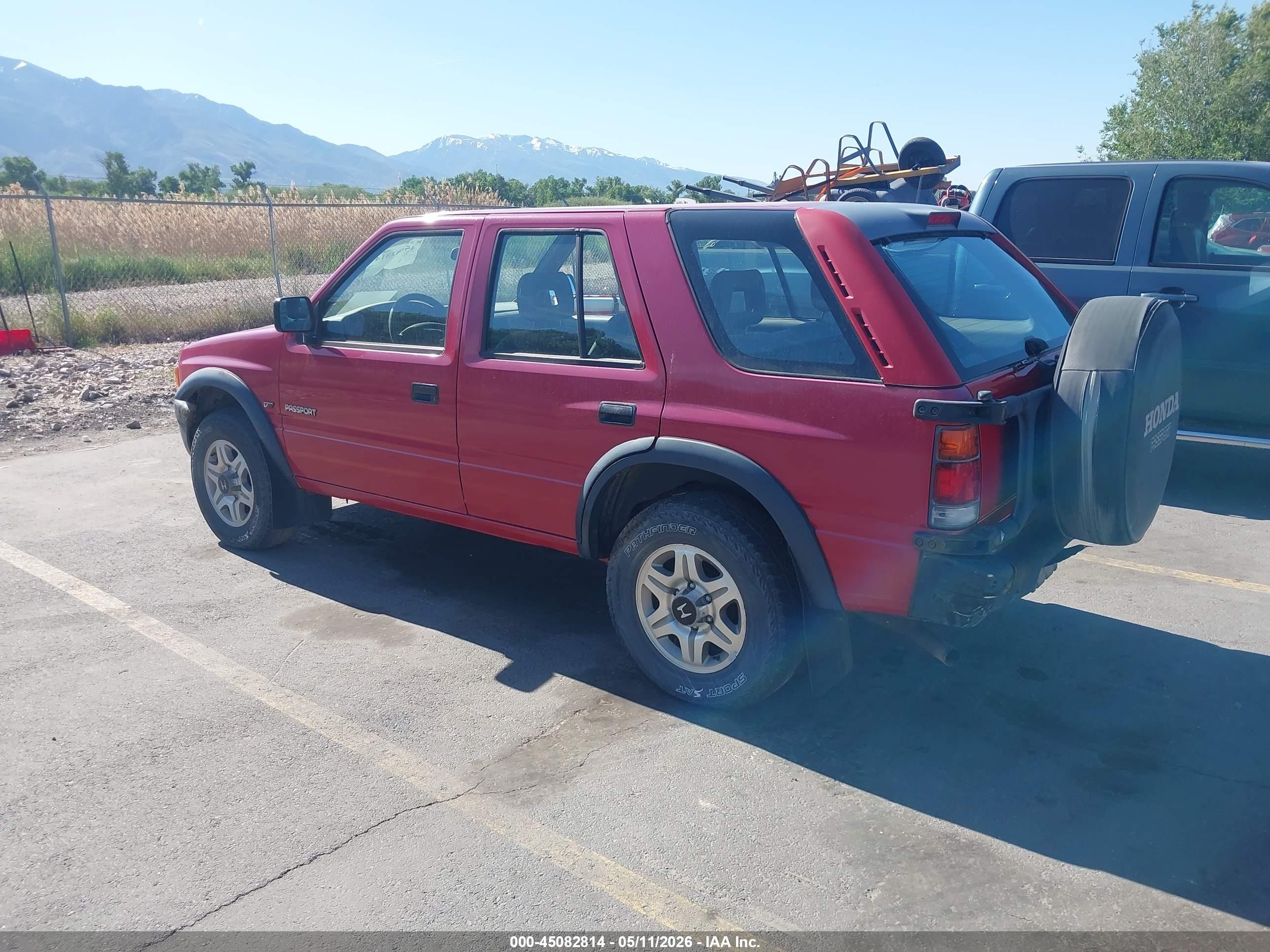 1997 Honda Passport VIN 4S6CM58V8V4400812 IAAI salvage auction — Normal Wear, Clear (Utah), sold $275 on 2026-07-09 (photo 3)