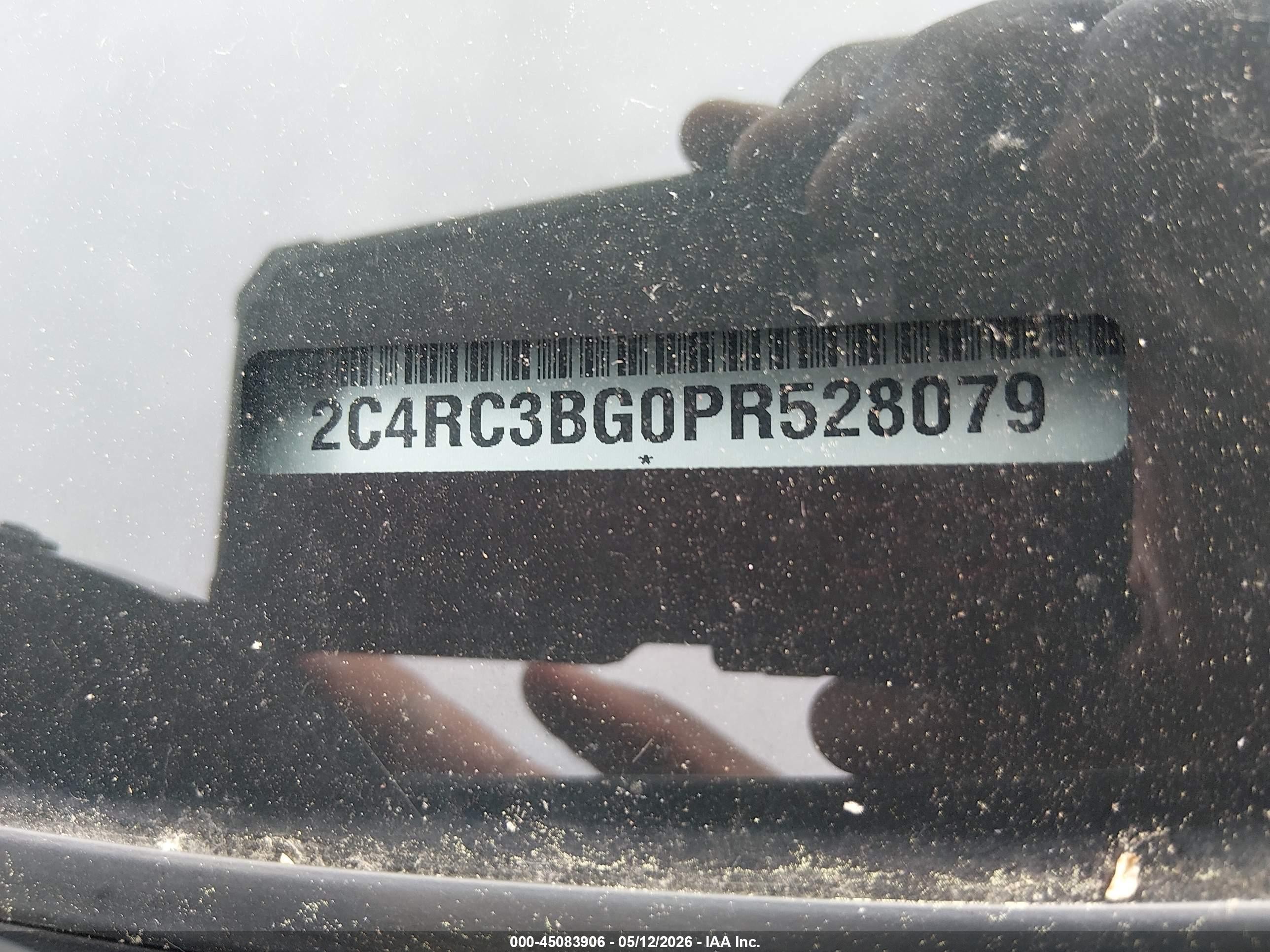 2023 Chrysler Pacifica VIN 2C4RC3BG0PR528079 IAAI salvage auction — Side, Salvage (Idaho), sold $7,600 on 2026-09-24 (photo 9)