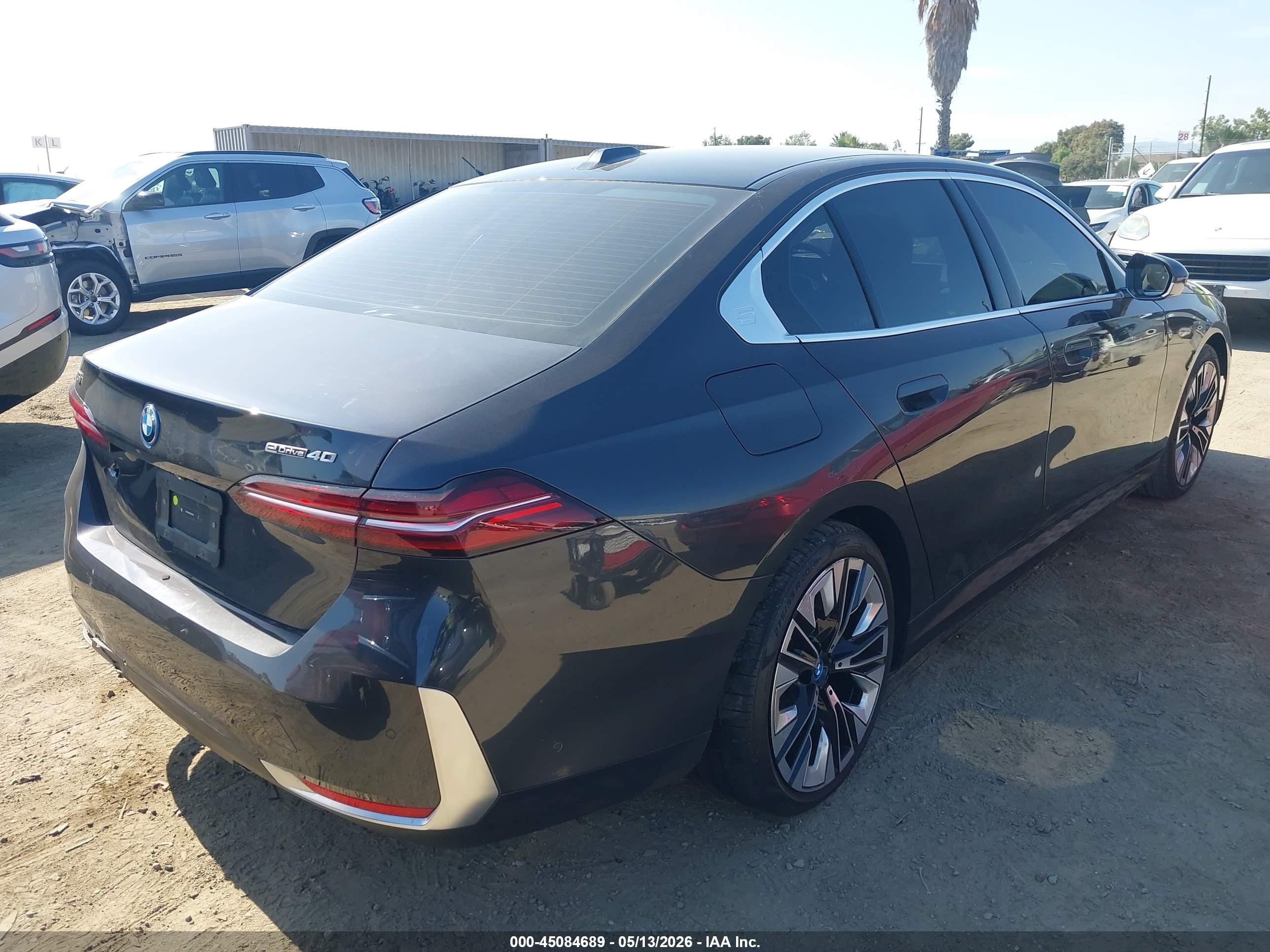2024 BMW I5 VIN WBY33FK03RCR97204 IAAI salvage auction — Side, Salvage (California), sold $23,350 on 2026-08-20 (photo 4)