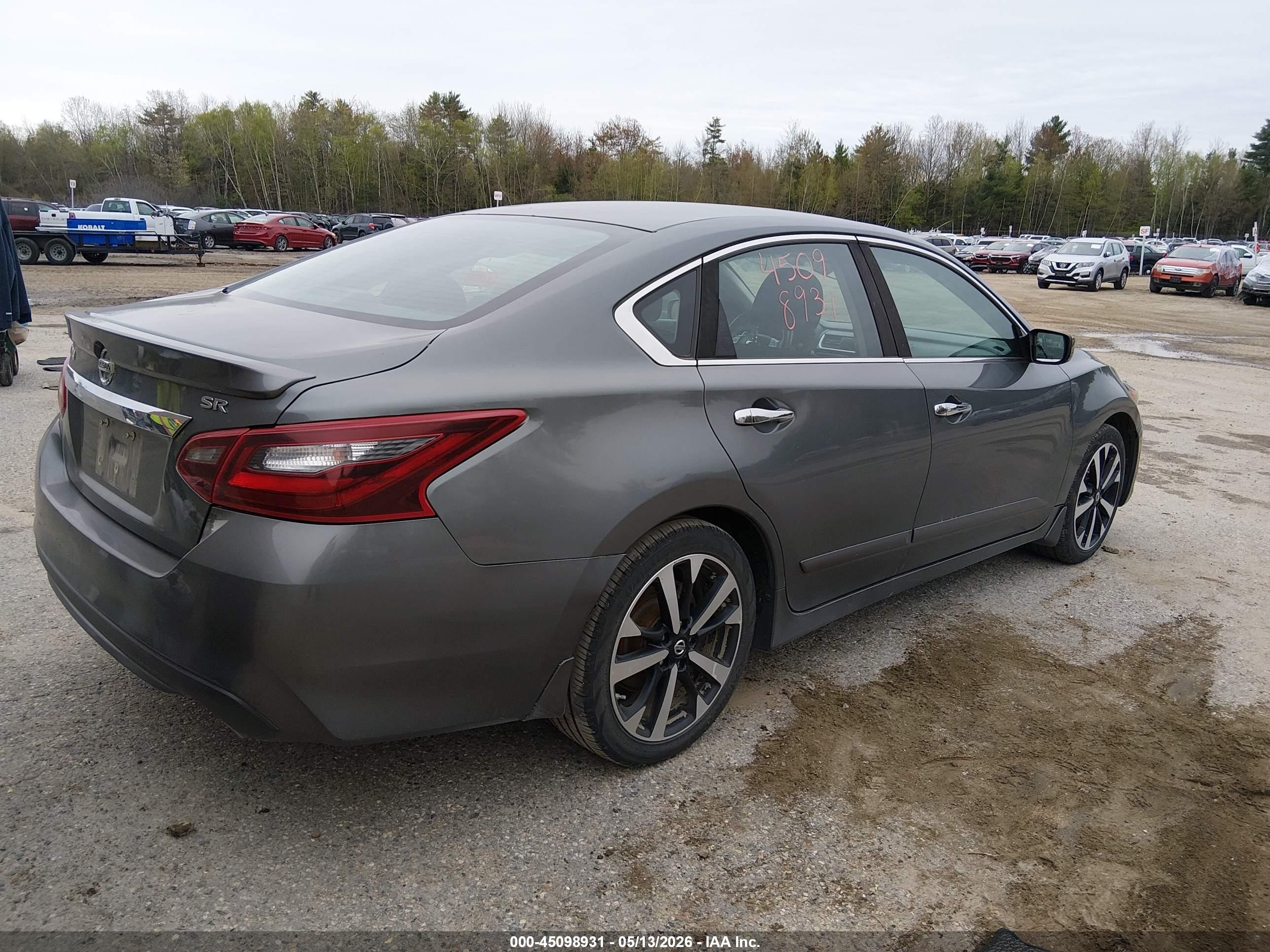 2018 Nissan Altima VIN 1N4AL3AP1JC123305 IAAI salvage auction — Side, Salvage (Maine), sold $800 on 2026-09-12 (photo 4)