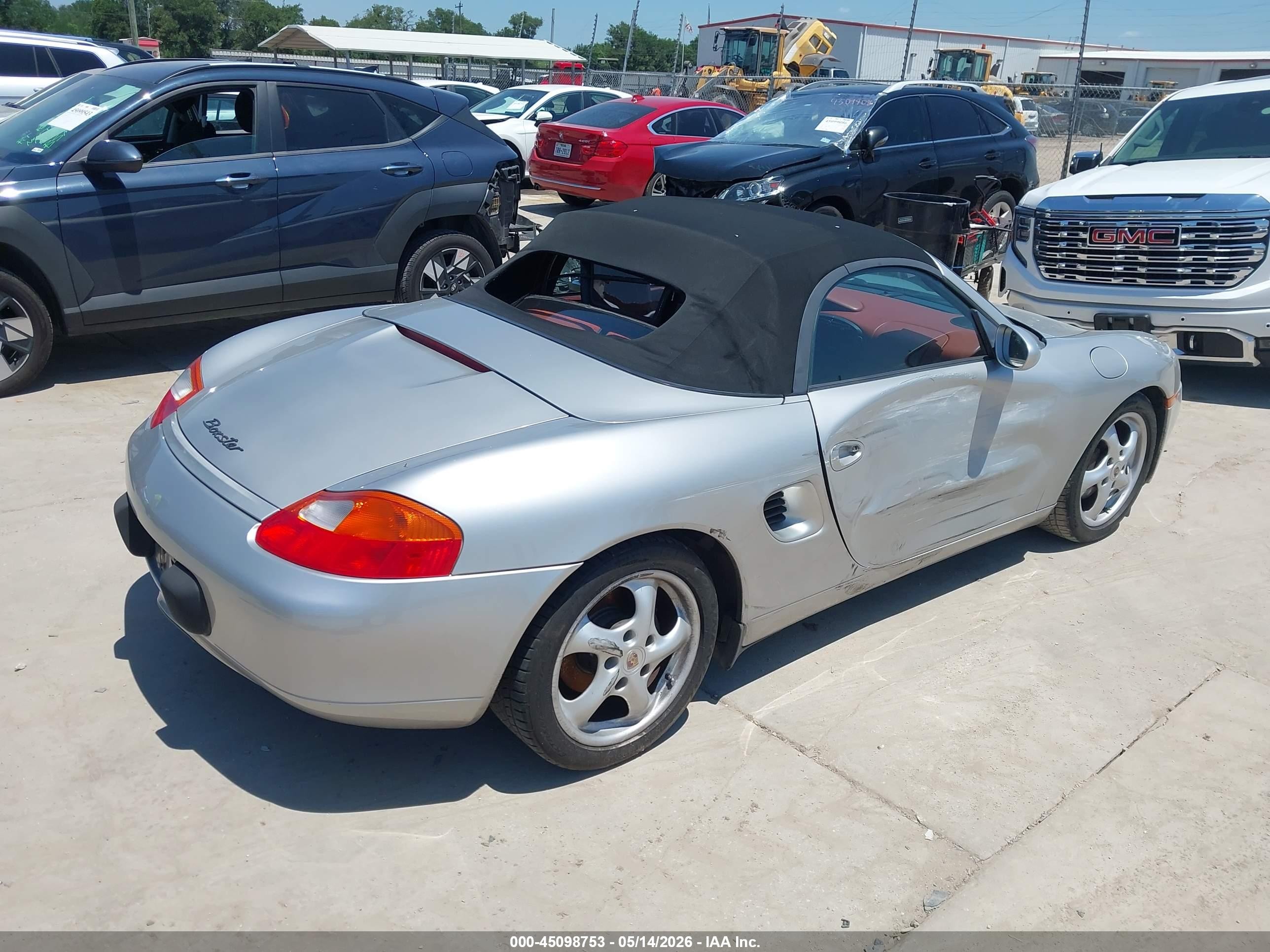 1999 Porsche Boxster VIN WP0CA2988XU623206 IAAI salvage auction — Side, Original (Texas), sold $1,400 on 2026-06-30 (photo 4)