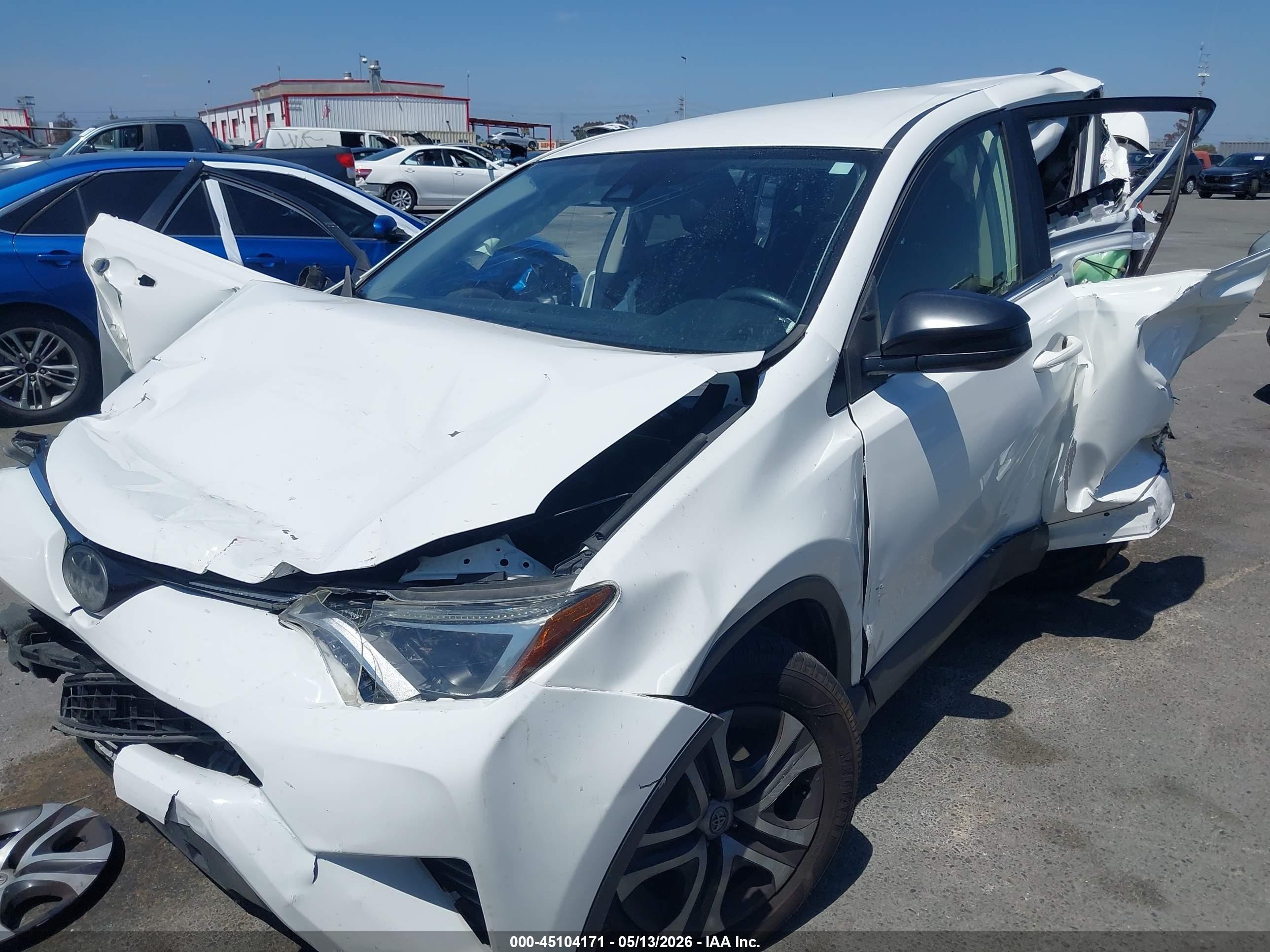 2018 Toyota RAV4 VIN JTMZFREV0JJ729156 IAAI salvage auction — Front & Rear, Salvage (California), sold $1,800 on 2026-07-09 (photo 2)