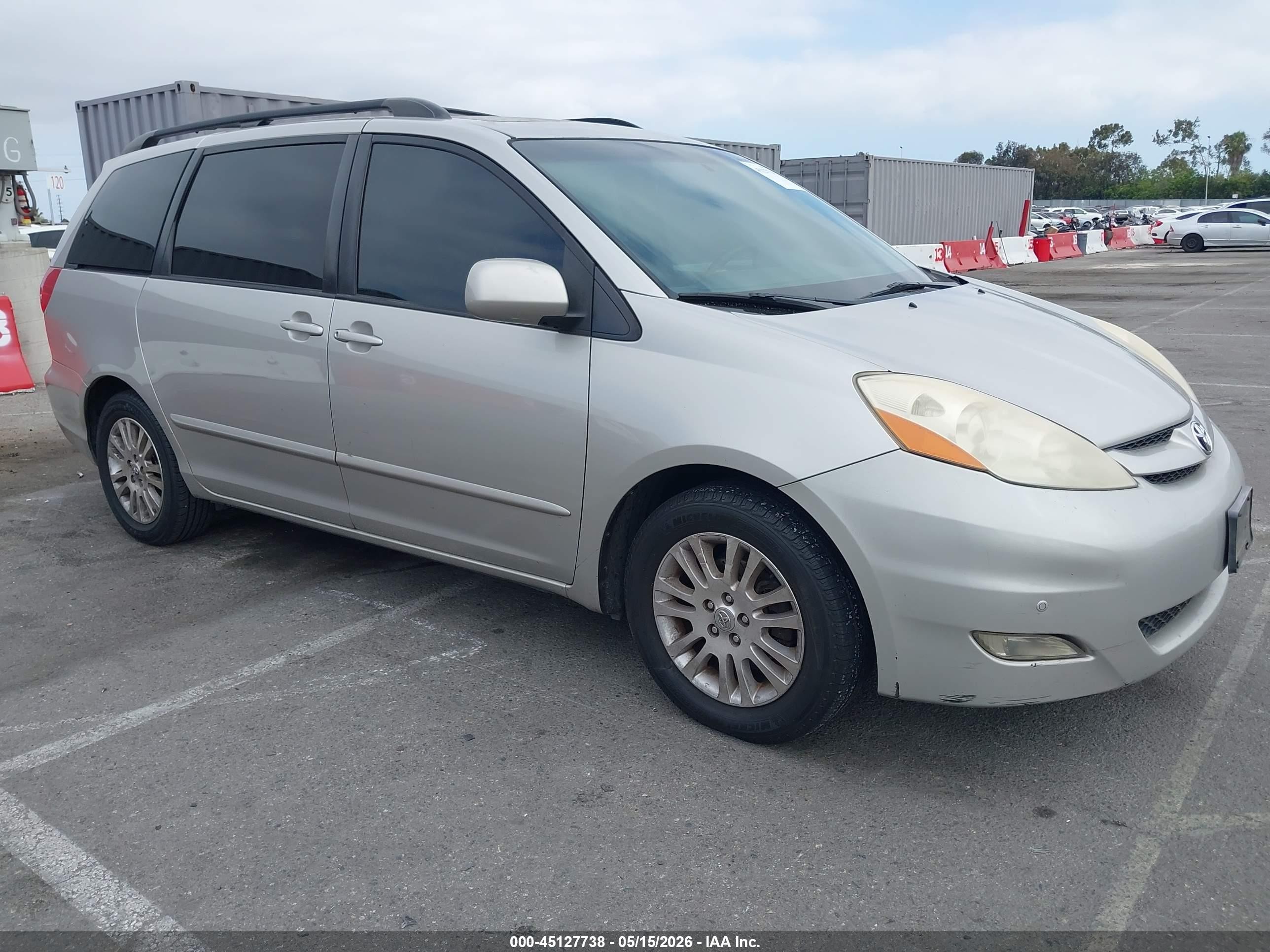 2010 Toyota Sienna VIN 5TDYK4CC6AS304460 IAAI salvage auction — Side, Salvage (California), sold $1,150 on 2026-07-09 (photo 1)