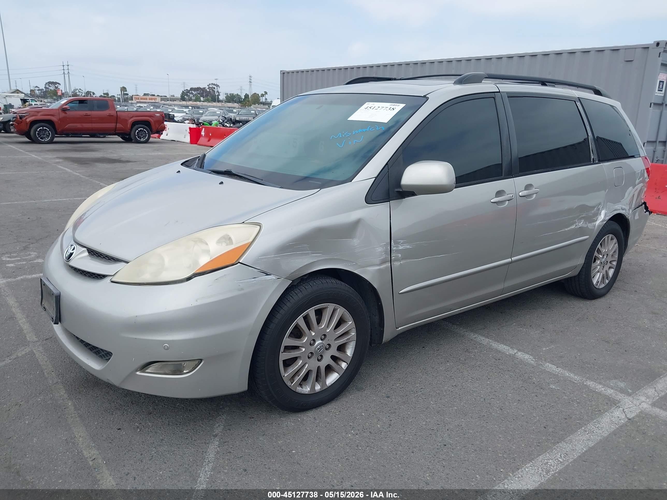 2010 Toyota Sienna VIN 5TDYK4CC6AS304460 IAAI salvage auction — Side, Salvage (California), sold $1,150 on 2026-07-09 (photo 2)