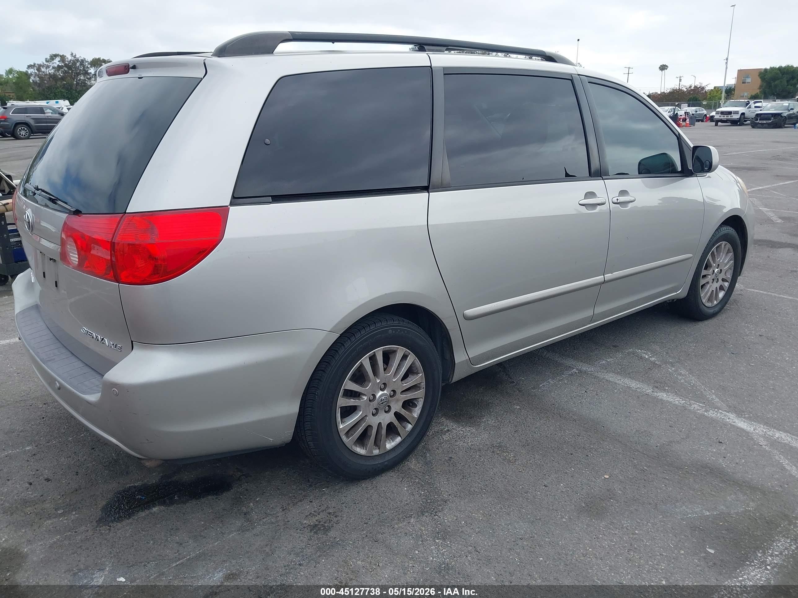 2010 Toyota Sienna VIN 5TDYK4CC6AS304460 IAAI salvage auction — Side, Salvage (California), sold $1,150 on 2026-07-09 (photo 4)