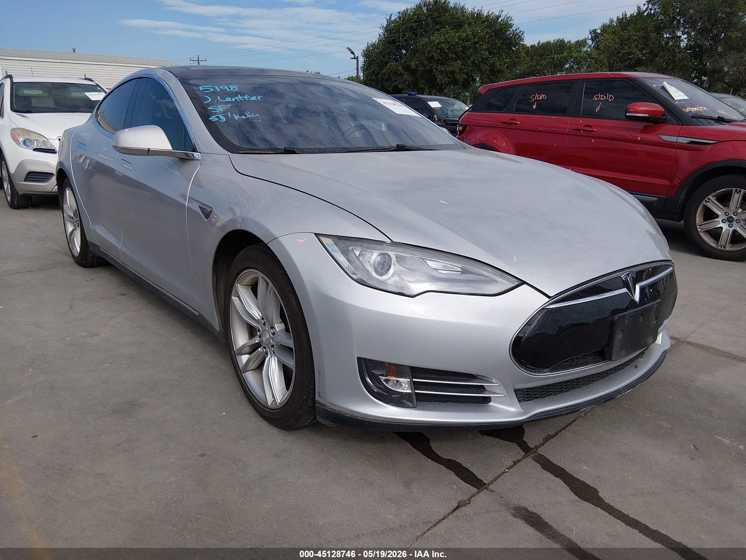2013 Tesla Model S VIN 5YJSA1CN0DFP17217 IAAI salvage auction — Side, Original (Texas), sold $1,875 on 2026-06-30 (photo 1)