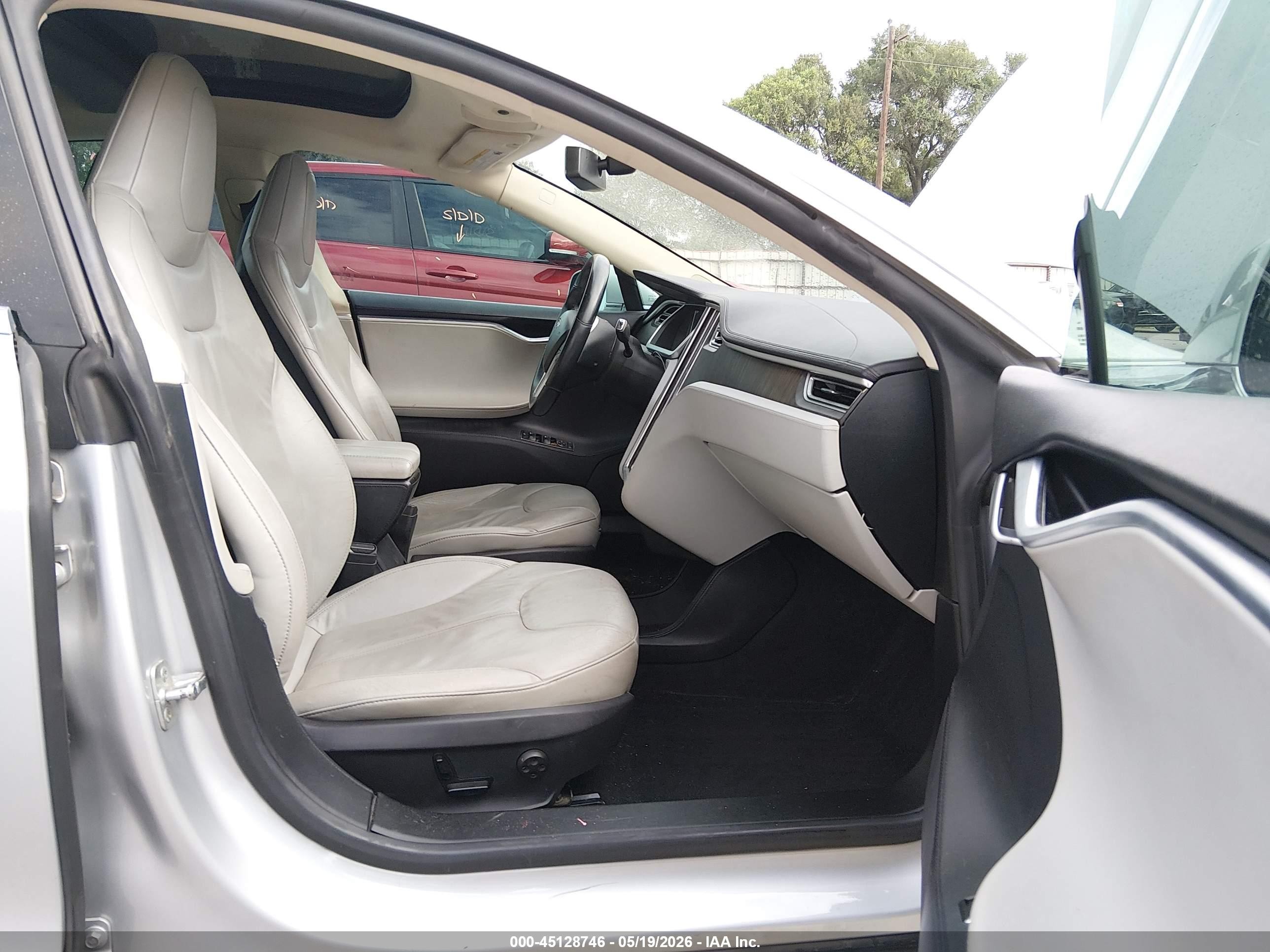 2013 Tesla Model S VIN 5YJSA1CN0DFP17217 IAAI salvage auction — Side, Original (Texas), sold $1,875 on 2026-06-30 (photo 5)
