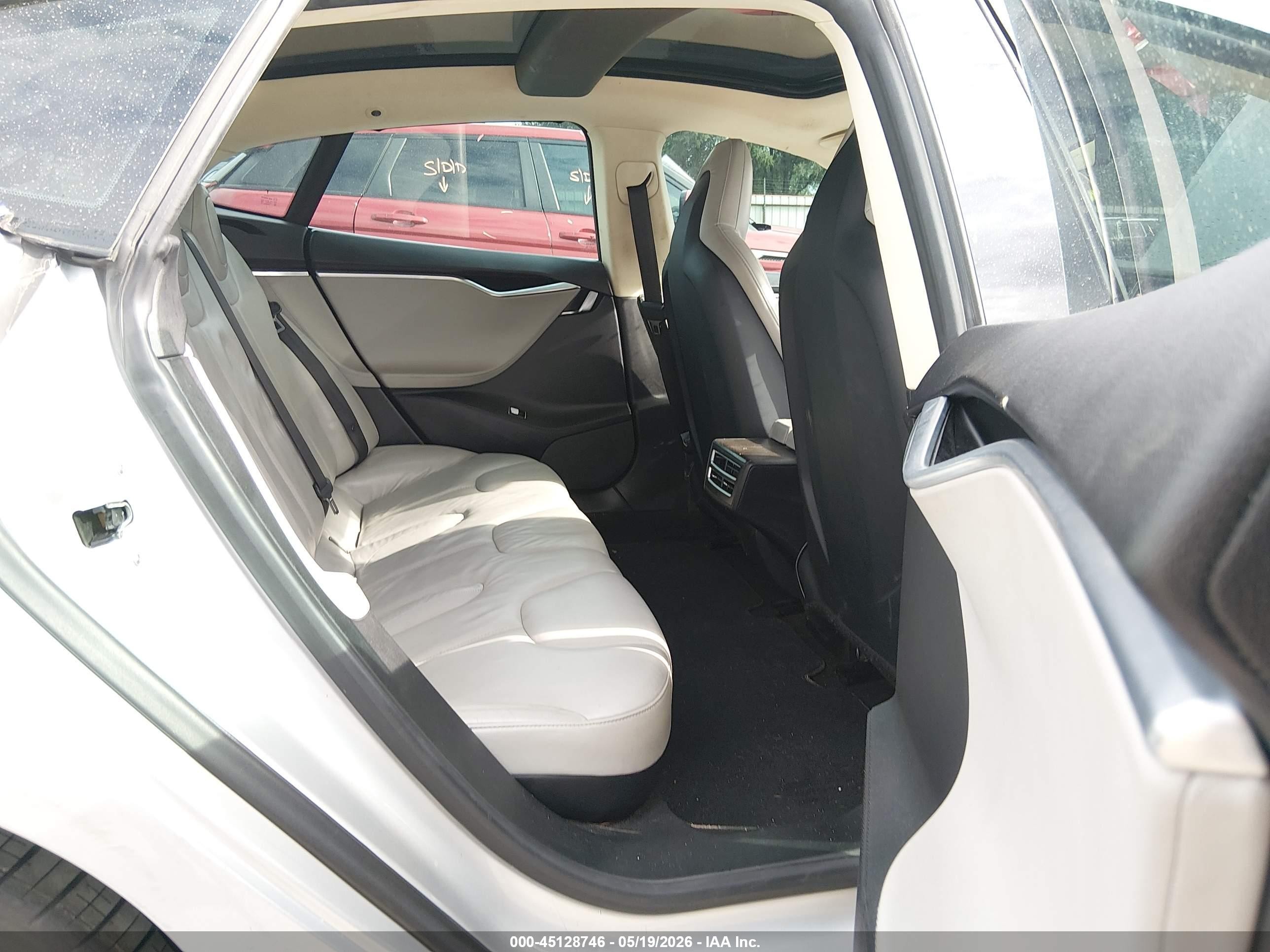 2013 Tesla Model S VIN 5YJSA1CN0DFP17217 IAAI salvage auction — Side, Original (Texas), sold $1,875 on 2026-06-30 (photo 8)
