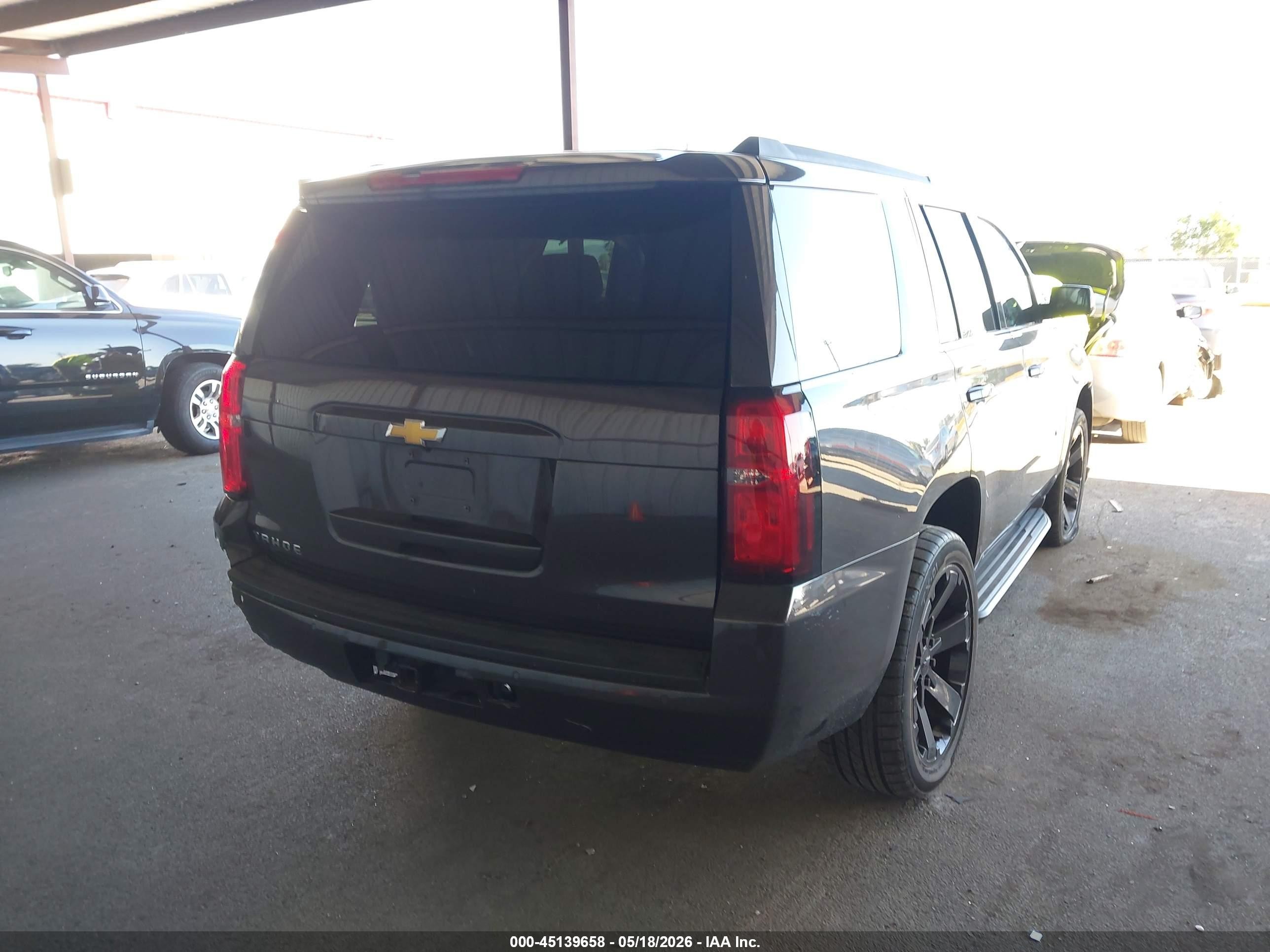 2018 Chevrolet Tahoe VIN 1GNSCAKC7JR308414 IAAI salvage auction — Side, Salvage (California), sold $5,050 on 2026-07-09 (photo 4)